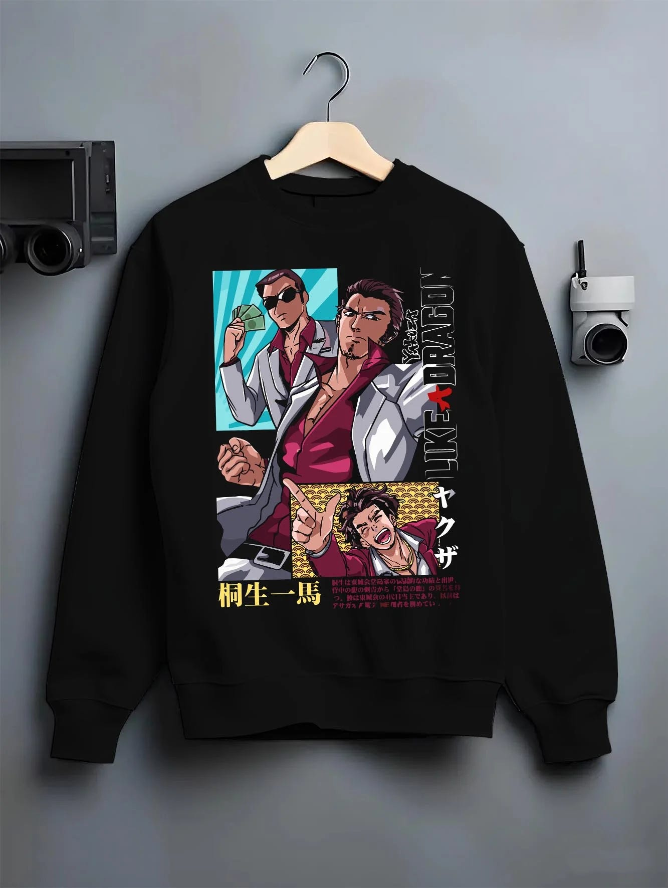 Black crewneck sweatshirt on hanger with Yakuza Hoodie Kazuma Kiryu Majima Goro Jumper graphic bold anime graphic.