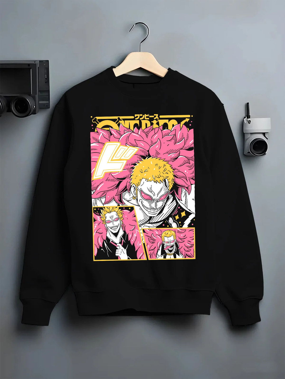 Black crewneck sweatshirt on hanger showing Donquixote Doflamingo from One Piece: pink feather coat collage