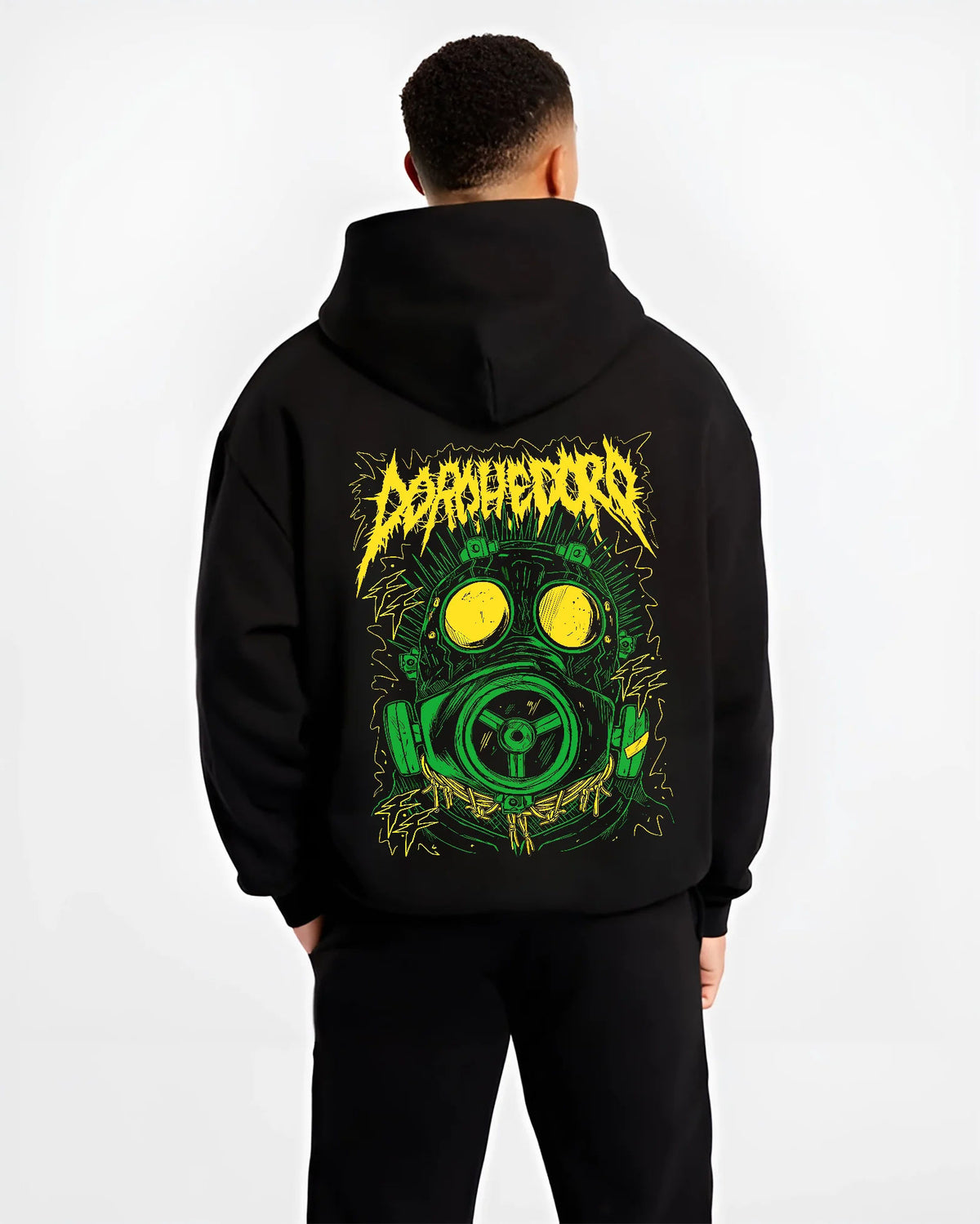 Black hoodie model back view showing Dorohedoro: green gas-mask character graphic