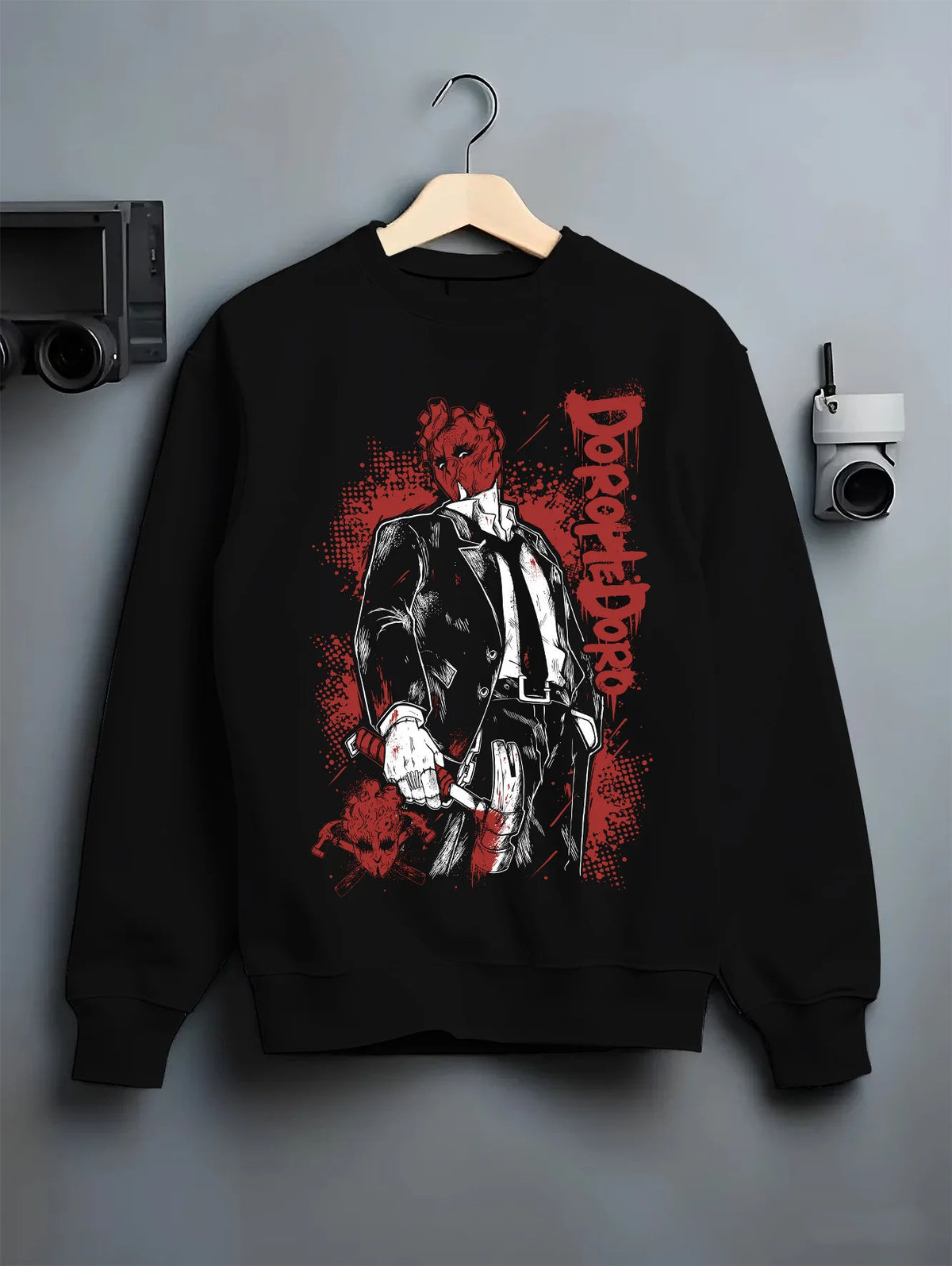 Black crewneck sweatshirt on hanger showing Dorohedoro: suited character with animal head
