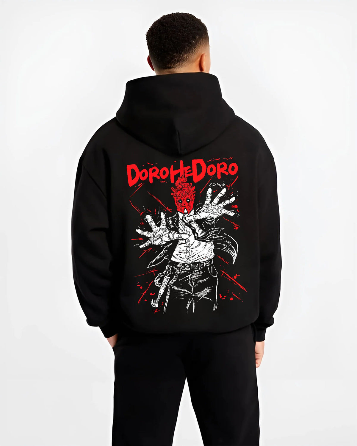 Black hoodie model back view showing Dorohedoro: Caiman/character red hand illustration