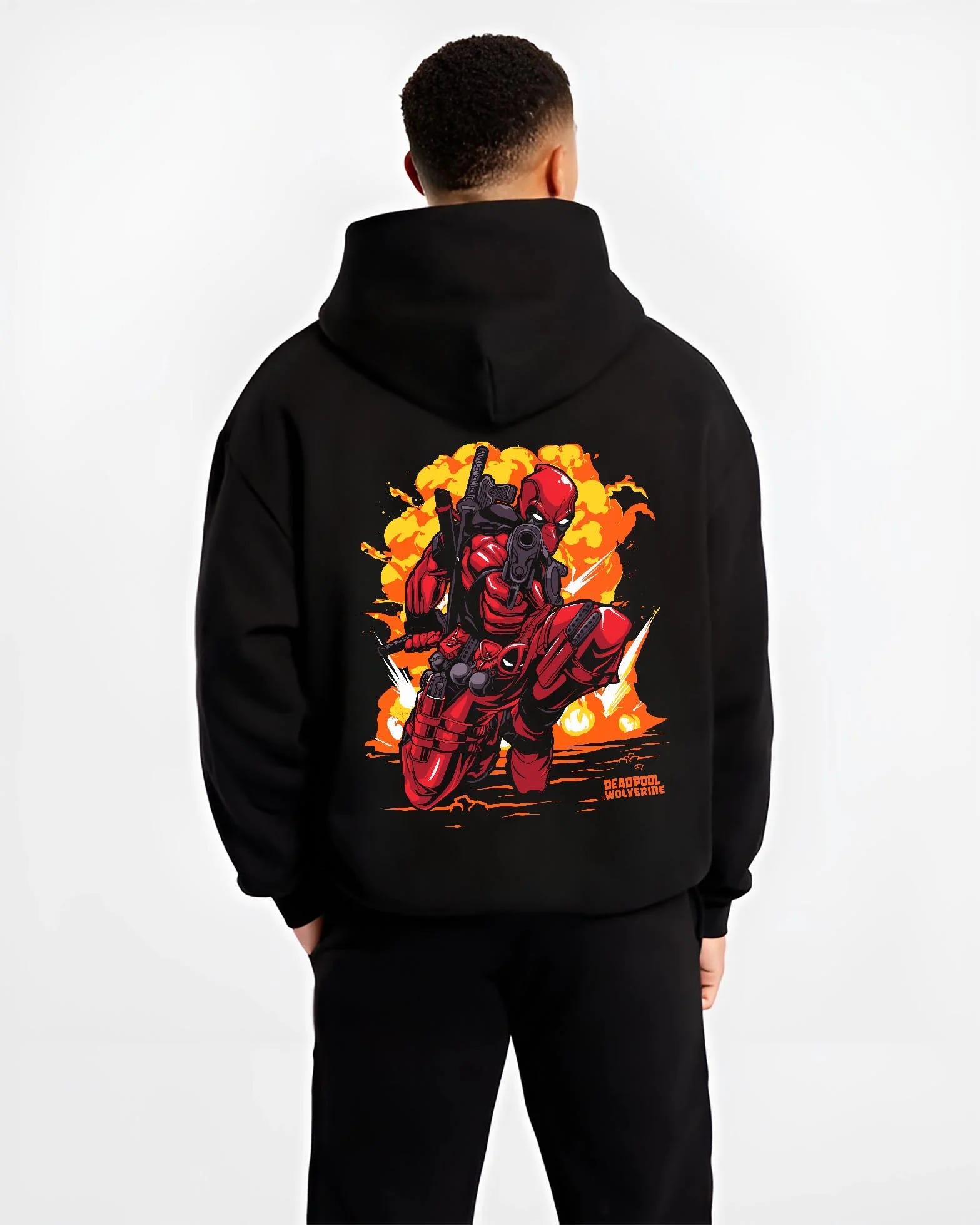 Black hoodie worn by male model, back view with Deadpool Hoodie Marvel Anime Cross Retro Parody Art graphic streetwear graphic.