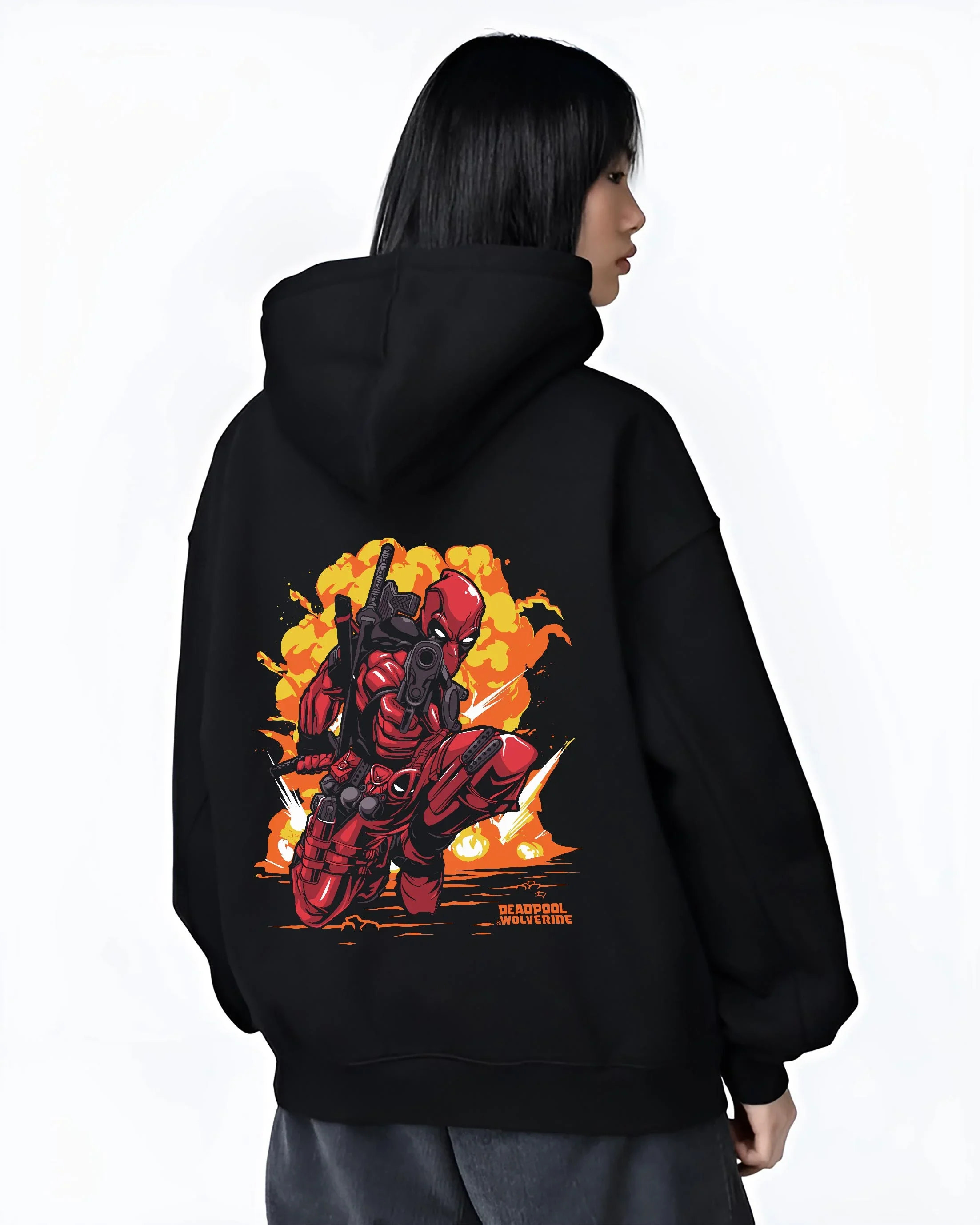 Black hoodie worn by female model, back view with Deadpool Hoodie Marvel Anime Cross Retro Parody Art graphic streetwear graphic.
