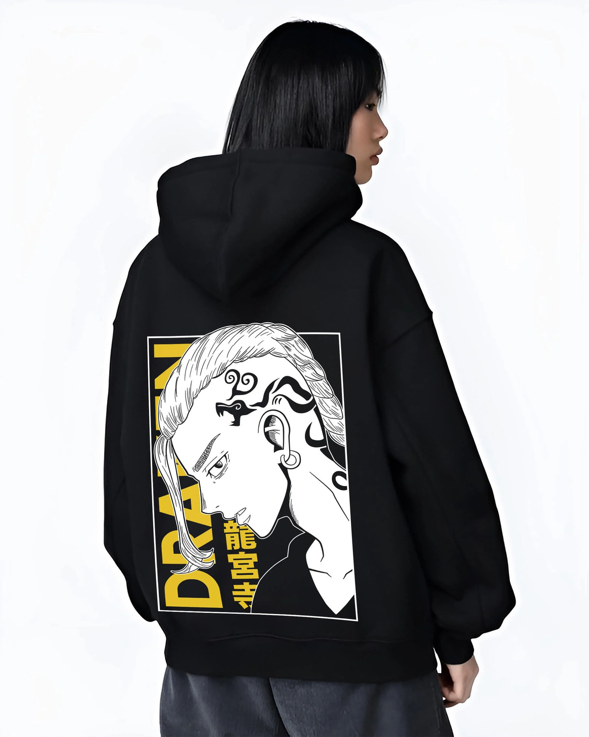 Black hoodie worn by female model from the back featuring Draken Tokyo Revengers Toman gang artwork.