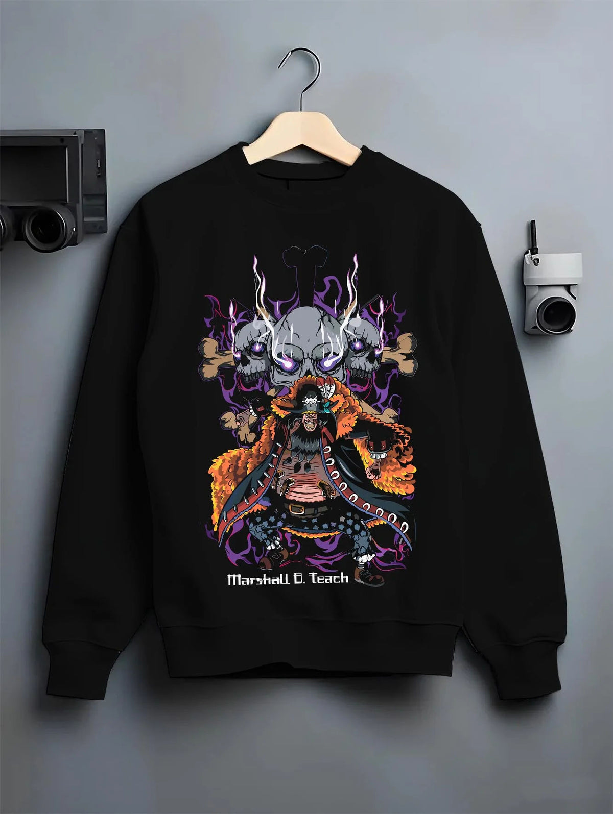 Black crewneck sweatshirt on hanger featuring Marshall D. Teach One Piece dark fruit artwork.