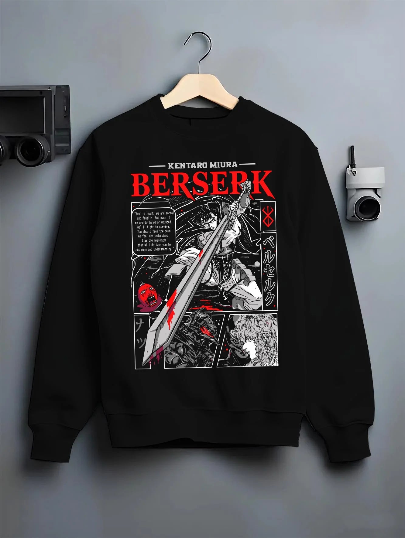 Black crewneck sweatshirt on hanger with Berserk Hoodie Guts Retro Dark Fantasy Warrior Art graphic Guts themed artwork.