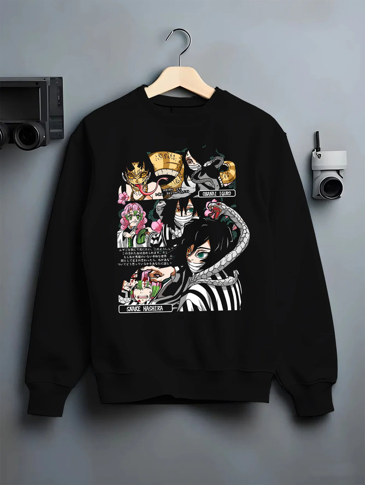 Black crewneck sweatshirt on hanger showing Demon Slayer: Obanai and Hashira collage