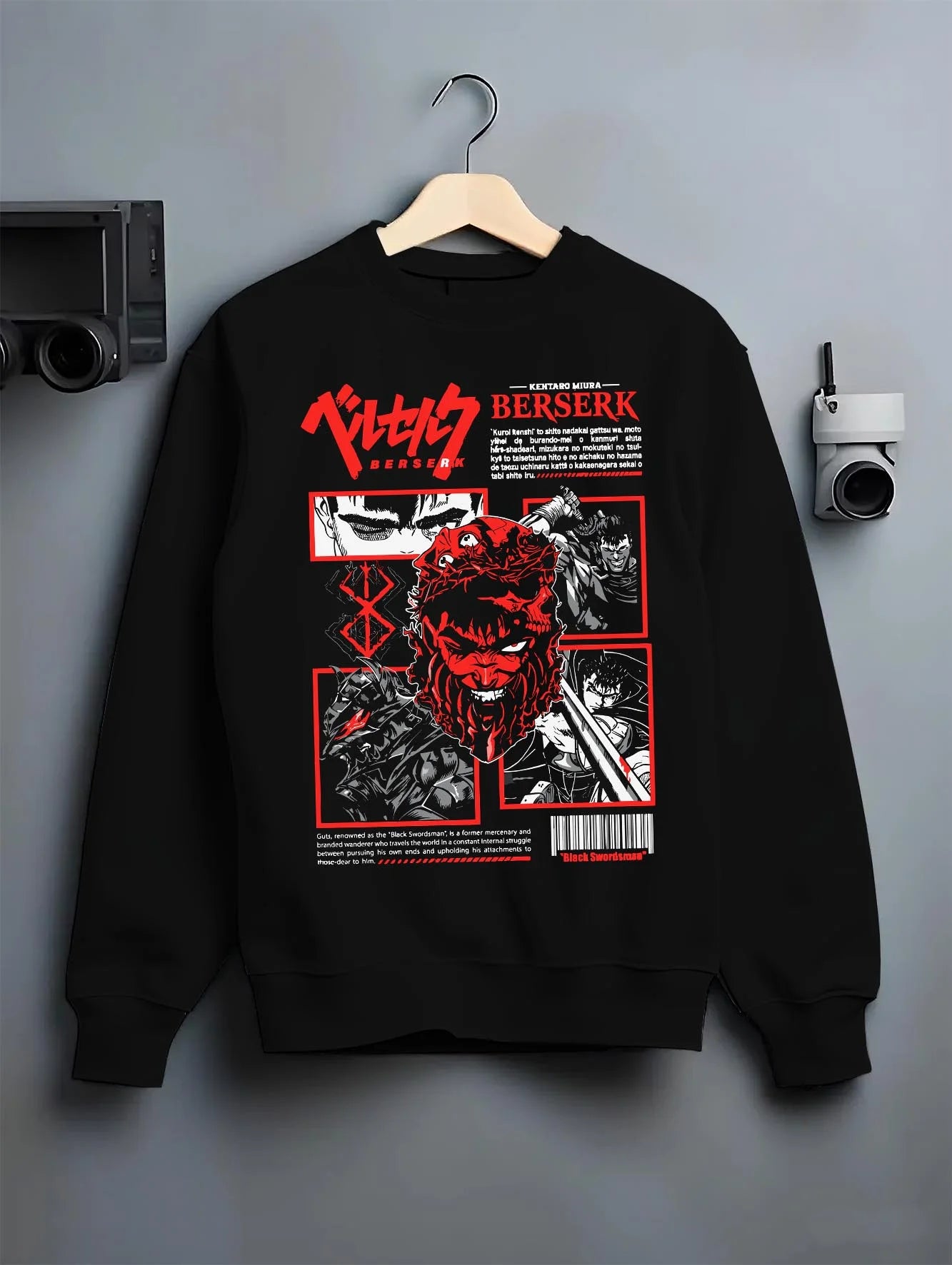 Black crewneck sweatshirt on hanger with Berserk Guts Skull Hoodie Dark Fantasy Retro Anime graphic streetwear graphic.