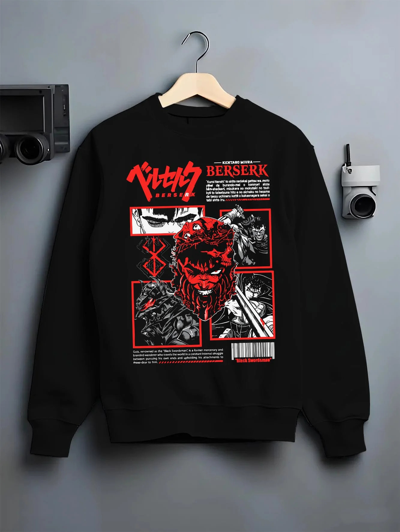 Black crewneck sweatshirt on hanger with Berserk Guts Skull Hoodie Dark Fantasy Retro Anime graphic streetwear graphic.