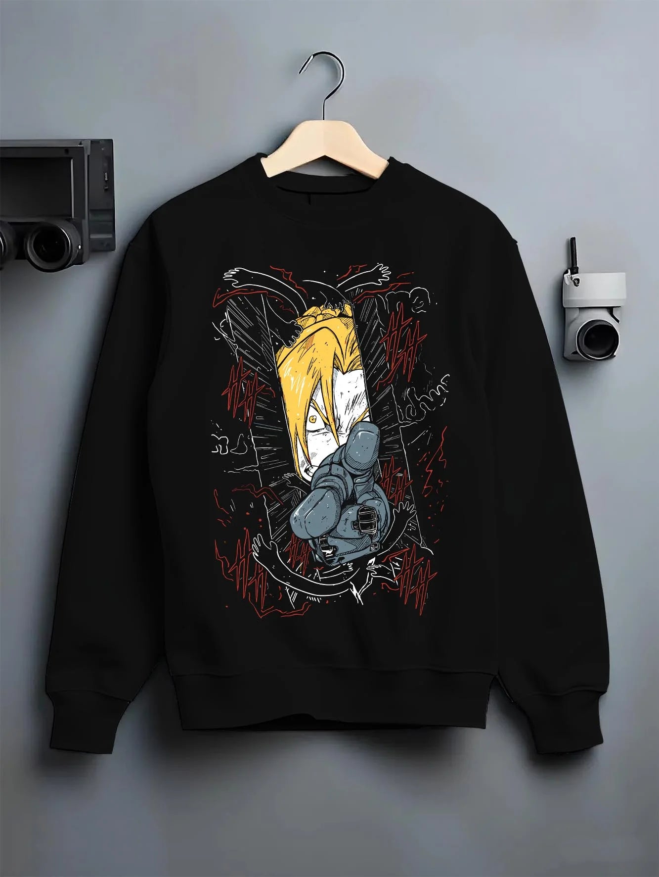 Black crewneck sweatshirt on hanger with Edward Elric Hoodie Fullmetal Alchemist Magic Circle graphic premium wear.