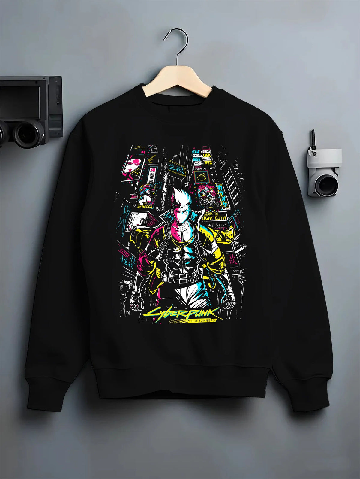 Black crewneck sweatshirt on hanger showing Cyberpunk from Cyberpunk: Edgerunners: neon city character composition