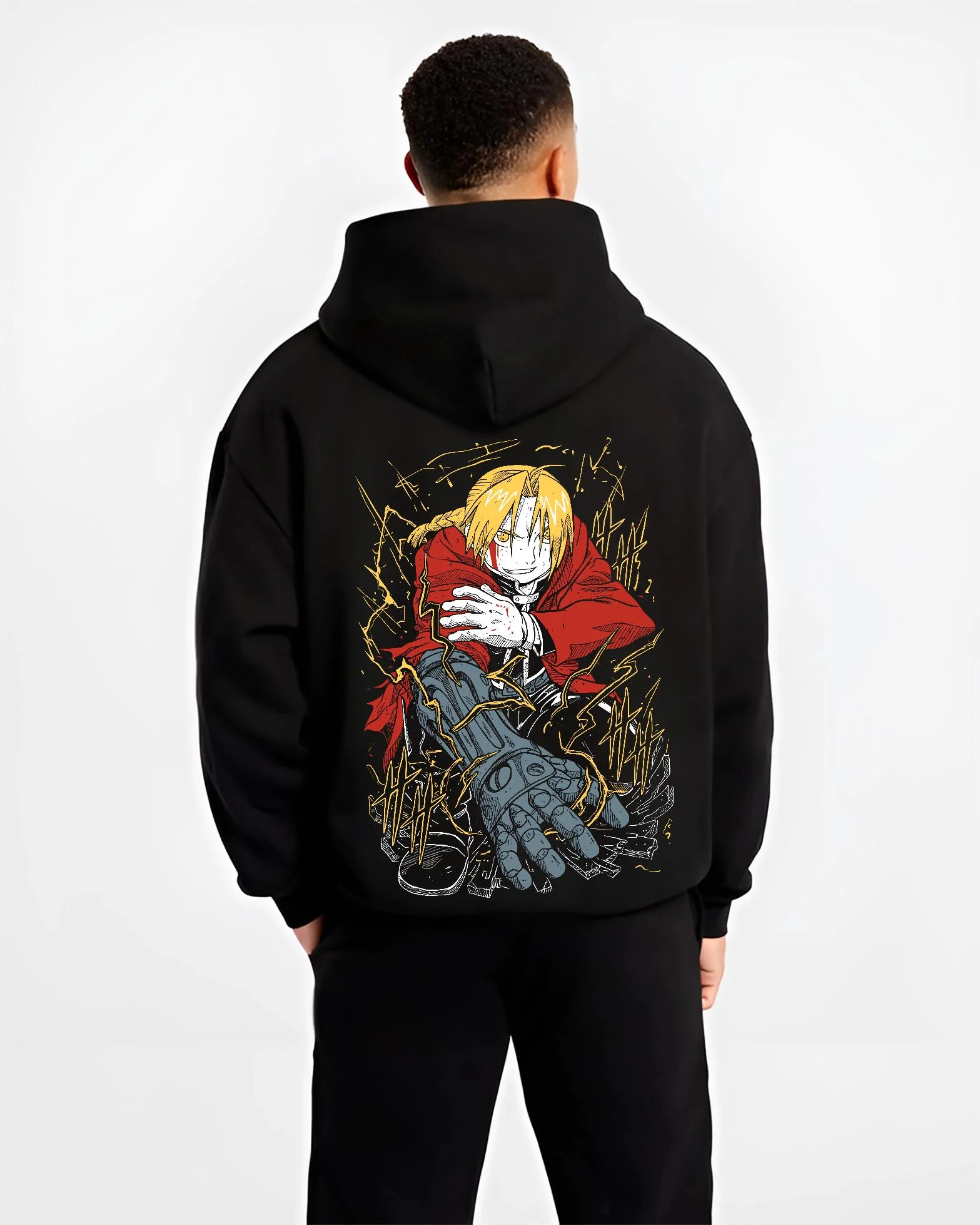 Black hoodie worn by male model, back view with Edward Elric Hoodie Fullmetal Alchemist Red Gloves graphic bold anime graphic.