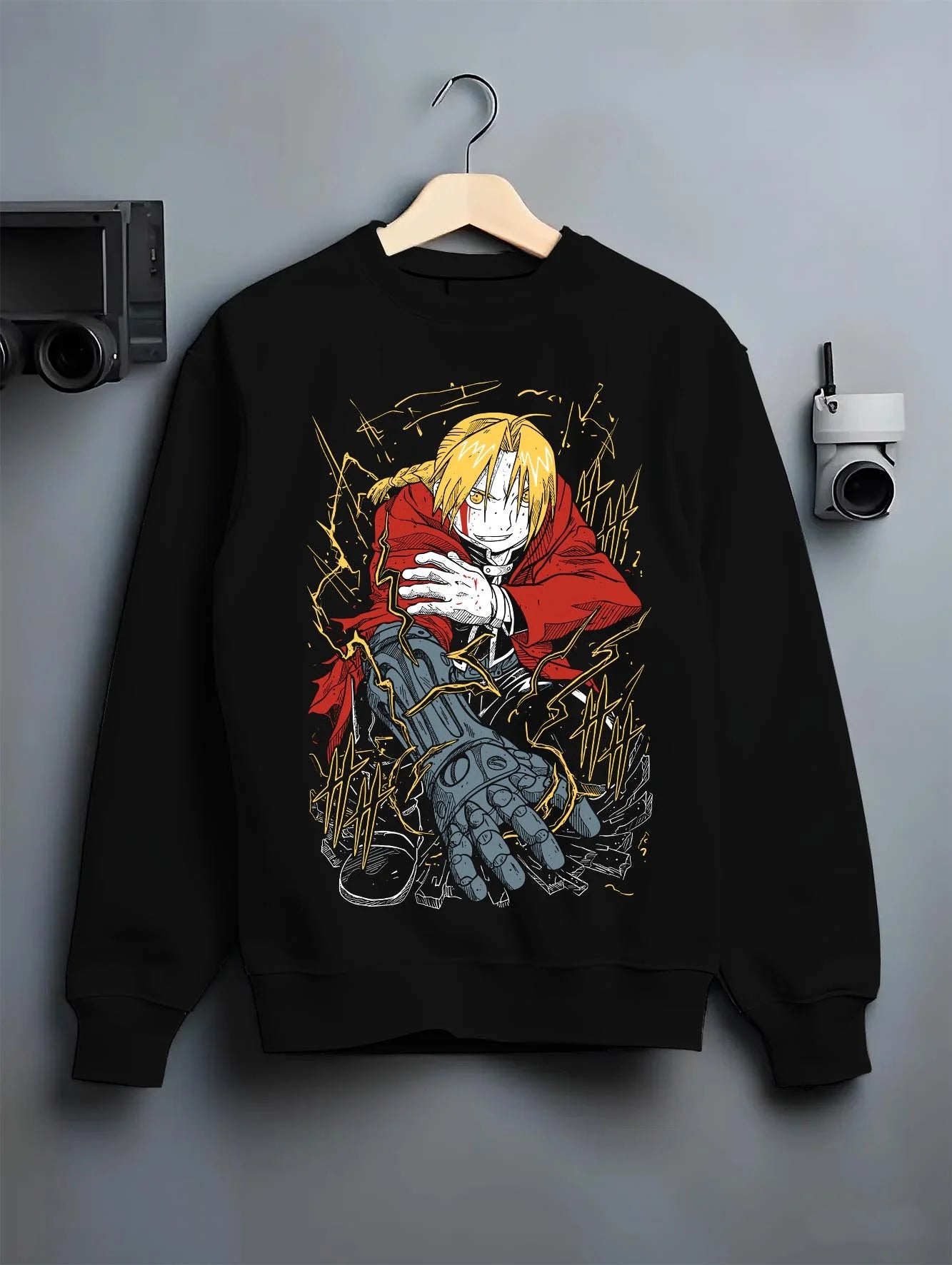 Black crewneck sweatshirt on hanger with Edward Elric Hoodie Fullmetal Alchemist Red Gloves graphic premium wear.