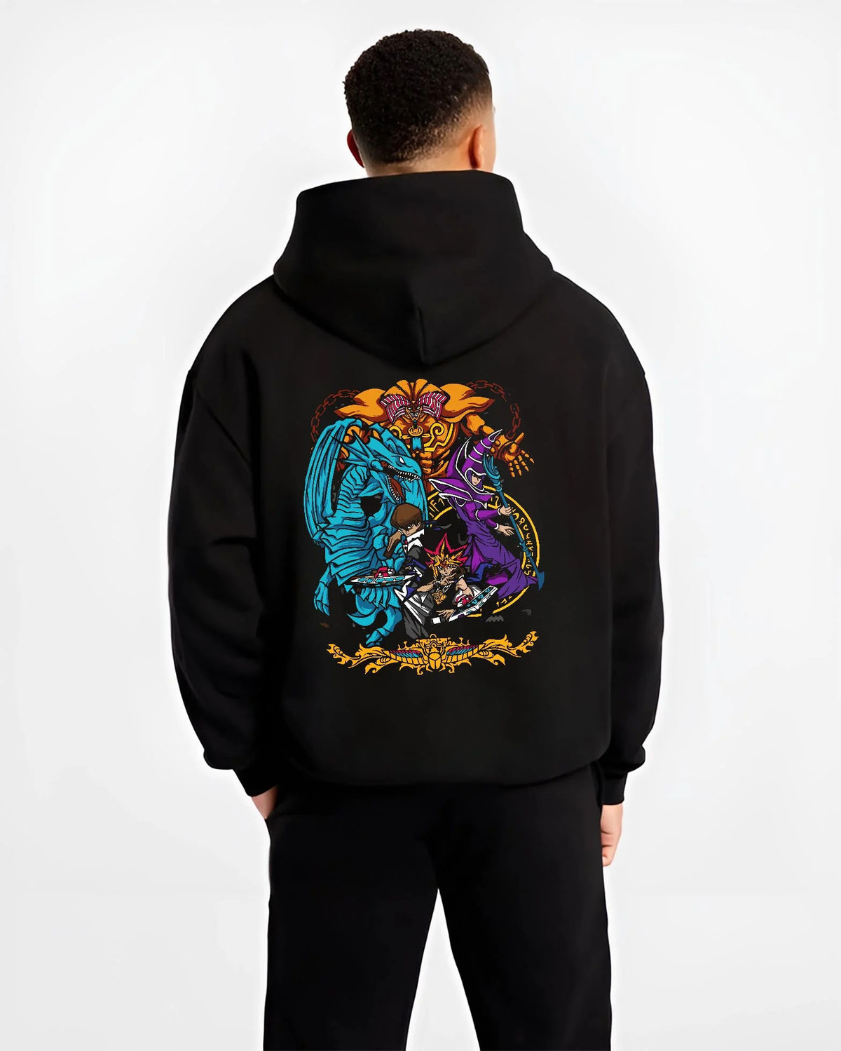 Black hoodie worn by male model from the back featuring Yu-Gi-Oh Egyptian Gods trio artwork.