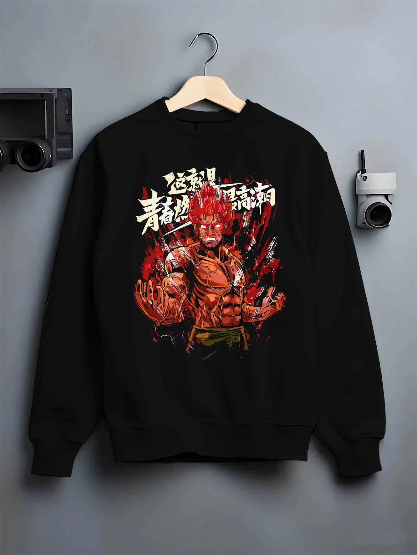 Black crewneck sweatshirt on hanger, showcasing Might Guy Naruto Shippuden retro streetwear artwork with shonen battle energy motif.