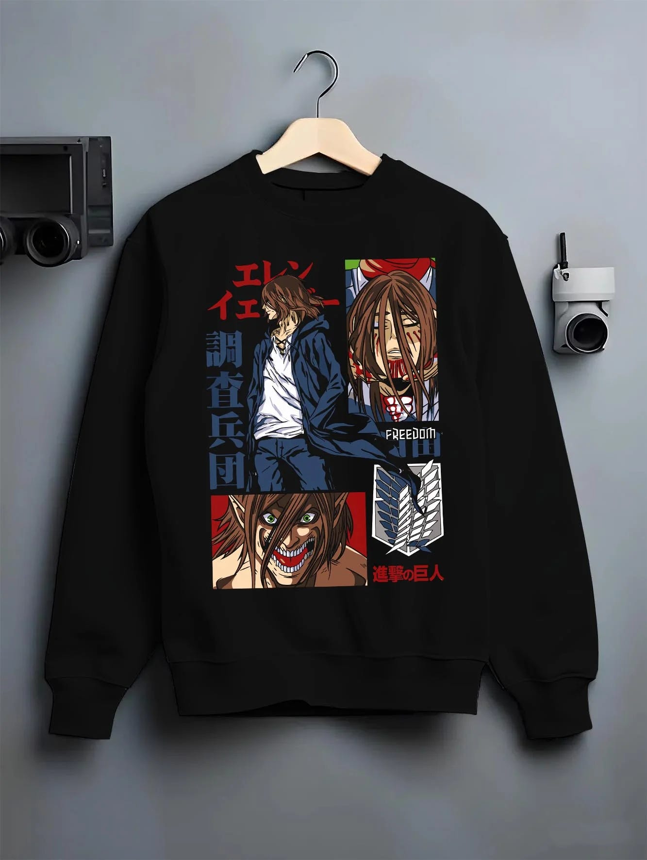 Black crewneck sweatshirt on hanger with Eren Yeager Hoodie Attack on Titan Survey Corps Look graphic premium wear.