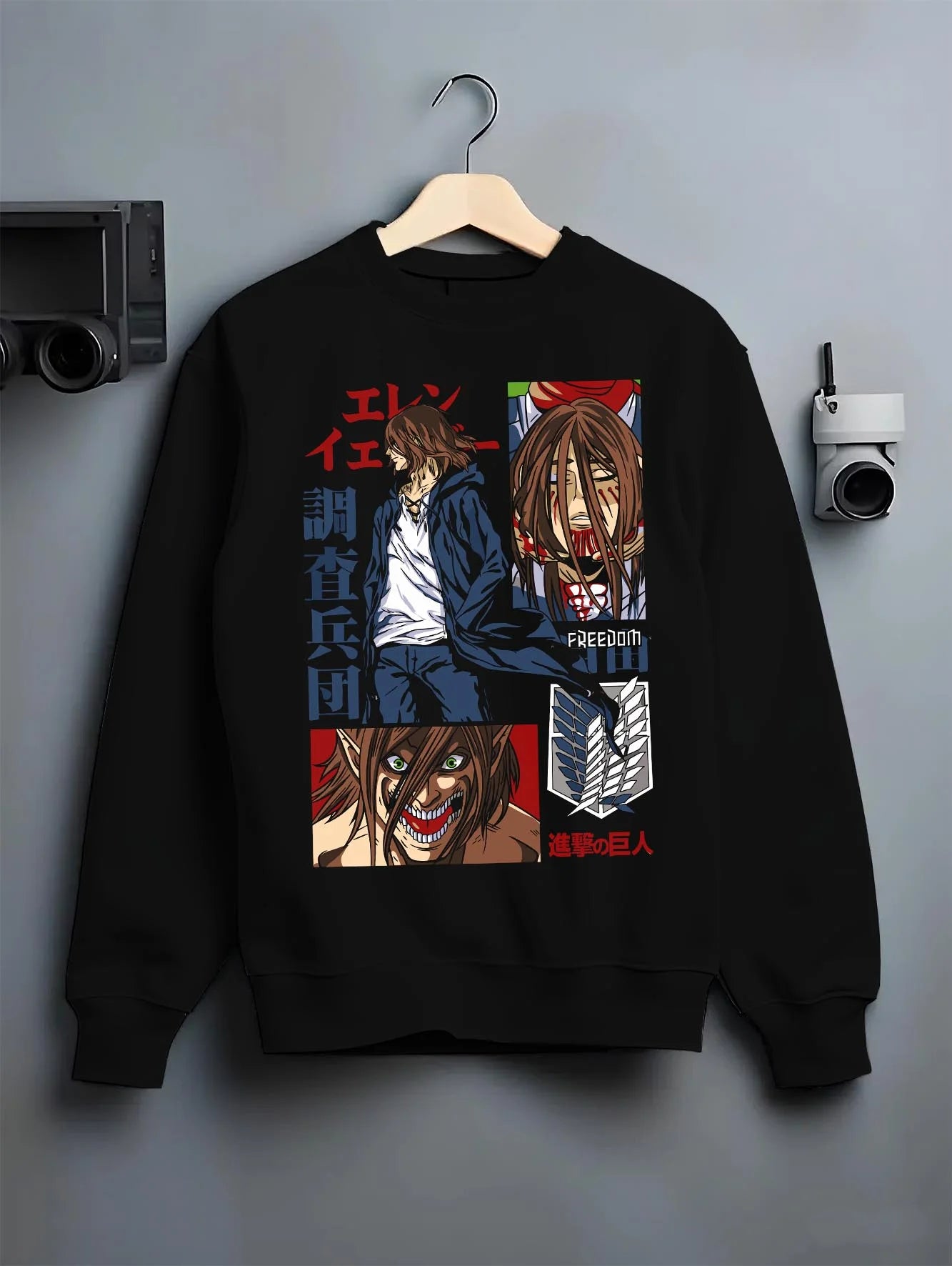 Black crewneck sweatshirt on hanger with Eren Yeager Hoodie Attack on Titan Survey Corps Look graphic premium wear.