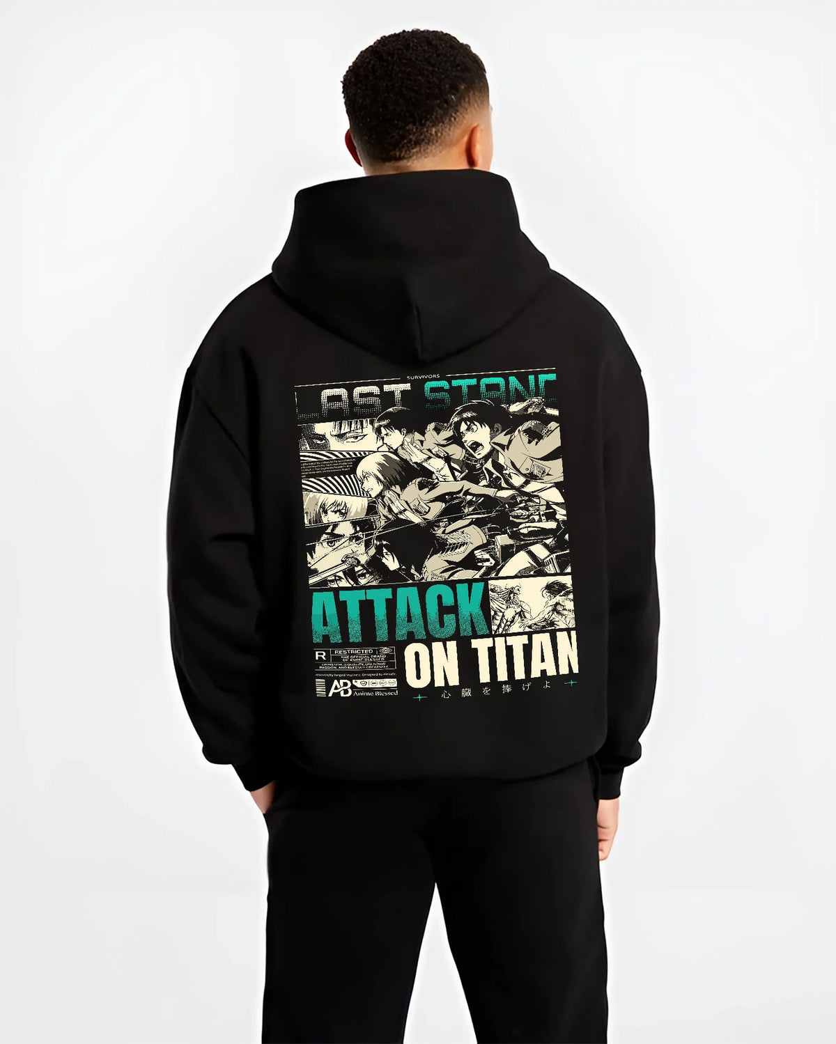 Black hoodie model back view showing Attack on Titan cast: vintage manga panel montage