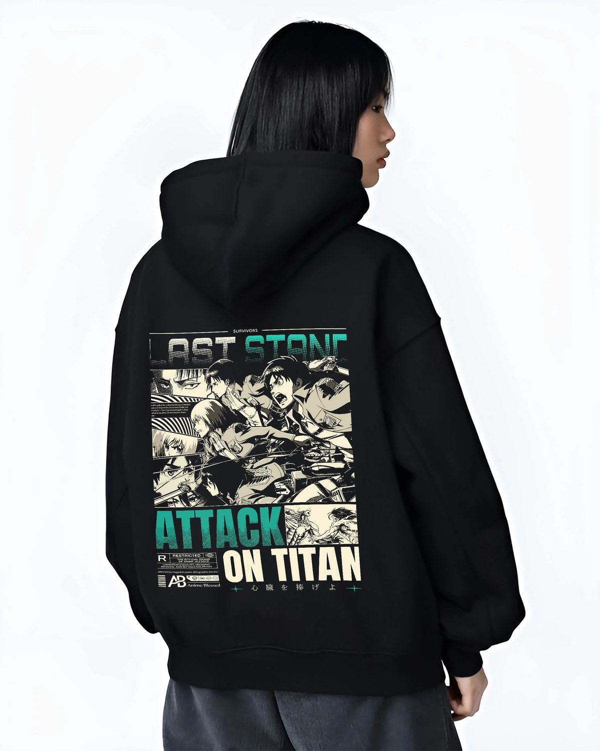 Black hoodie female model back view showing Attack on Titan cast: vintage manga panel montage
