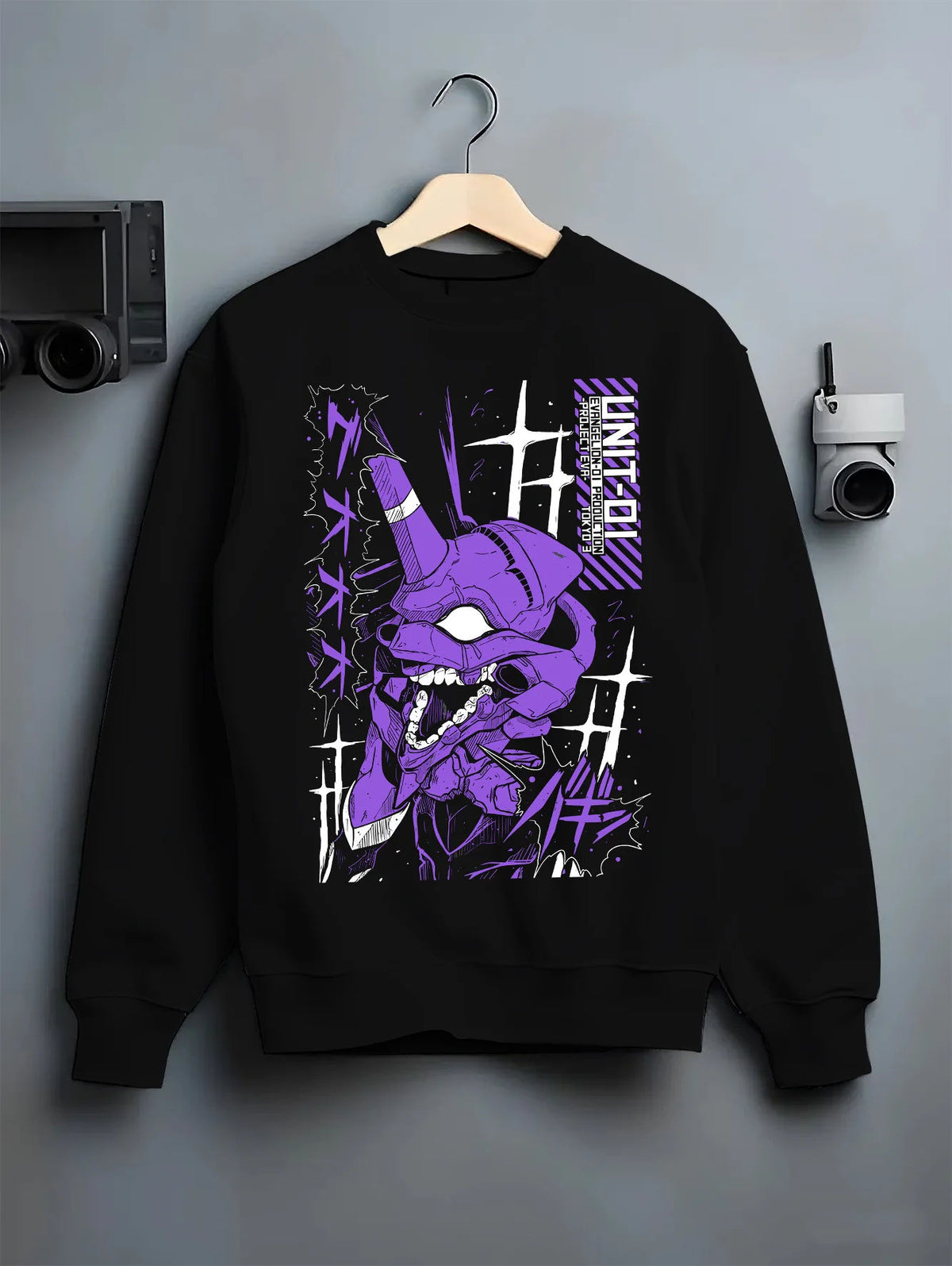 Black crewneck sweatshirt on hanger showing Evangelion Unit-01: purple mecha portrait