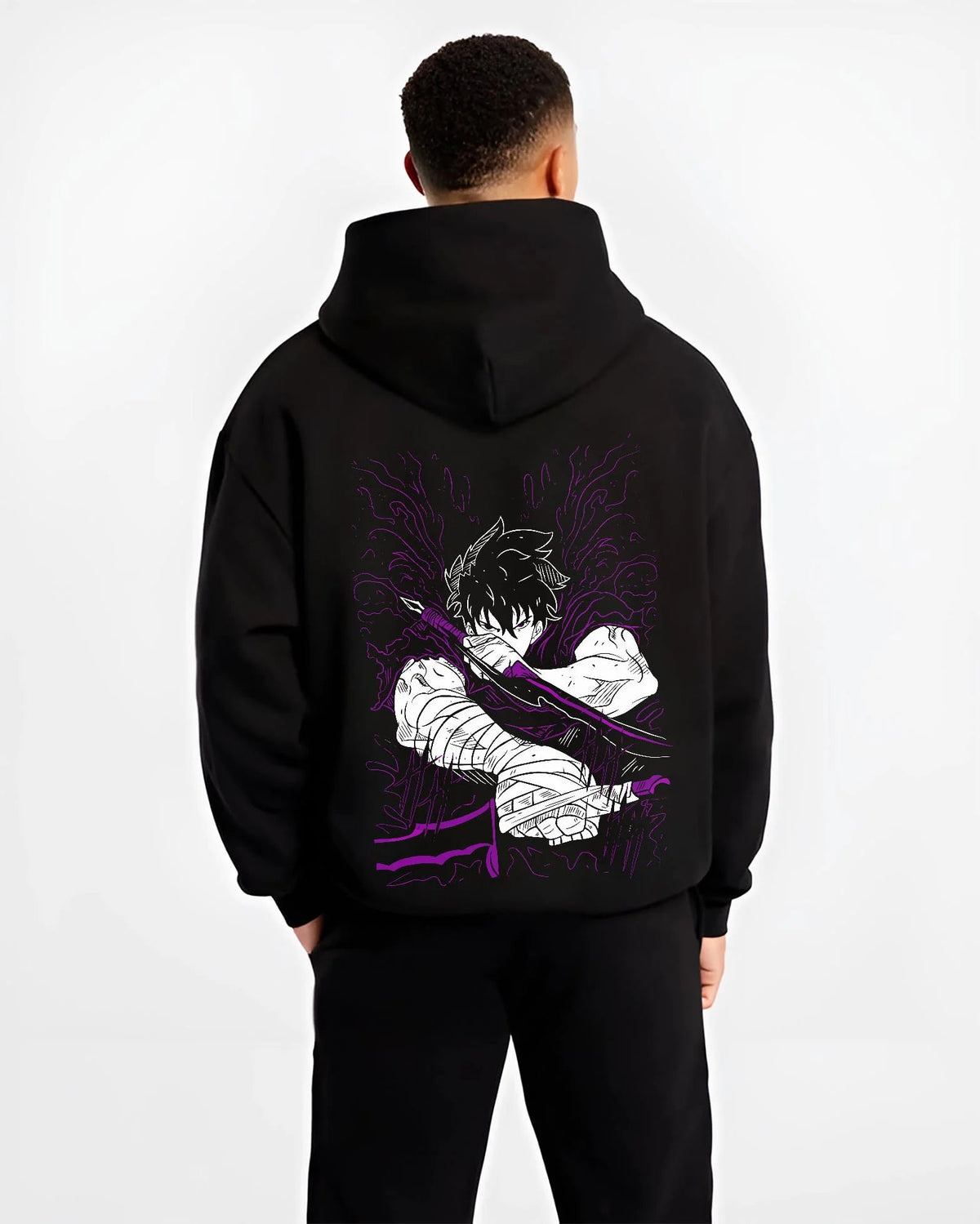 Black hoodie worn by male model from the back featuring Ken Kaneki Tokyo Ghoul dark awakening artwork.