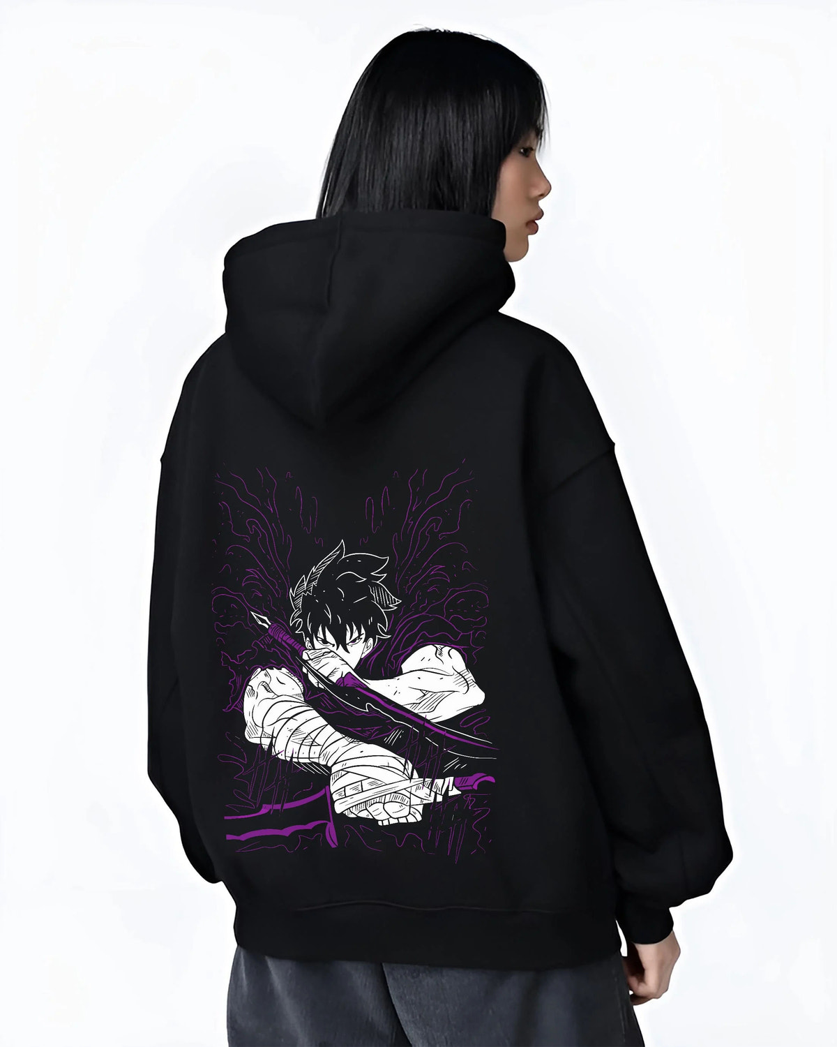 Black hoodie worn by female model from the back featuring Ken Kaneki Tokyo Ghoul dark awakening artwork.