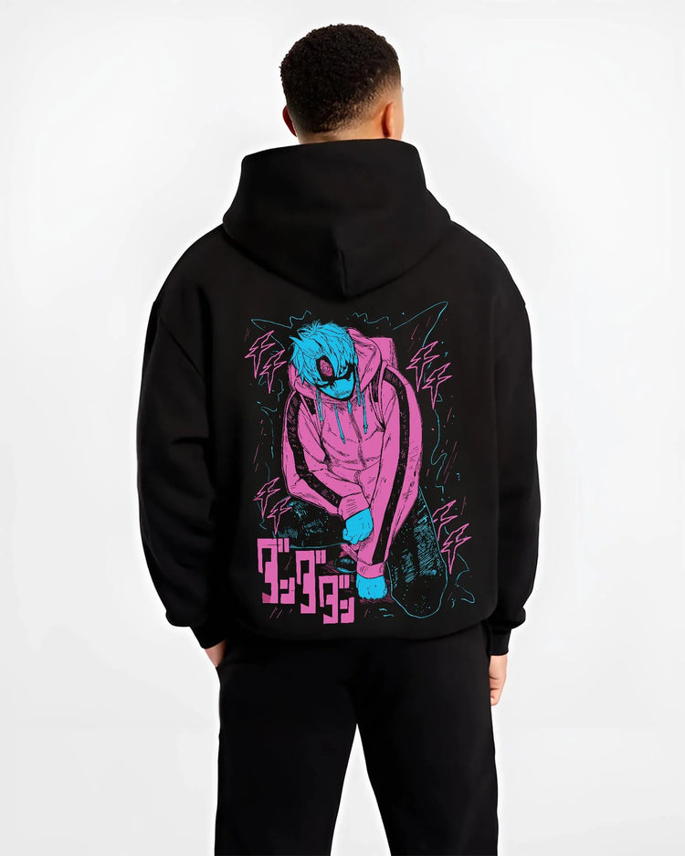 Black hoodie worn by male model, back view with JoJo Hoodie Yoshikage Kira Bizarre Adventure Killer graphic bold anime graphic.