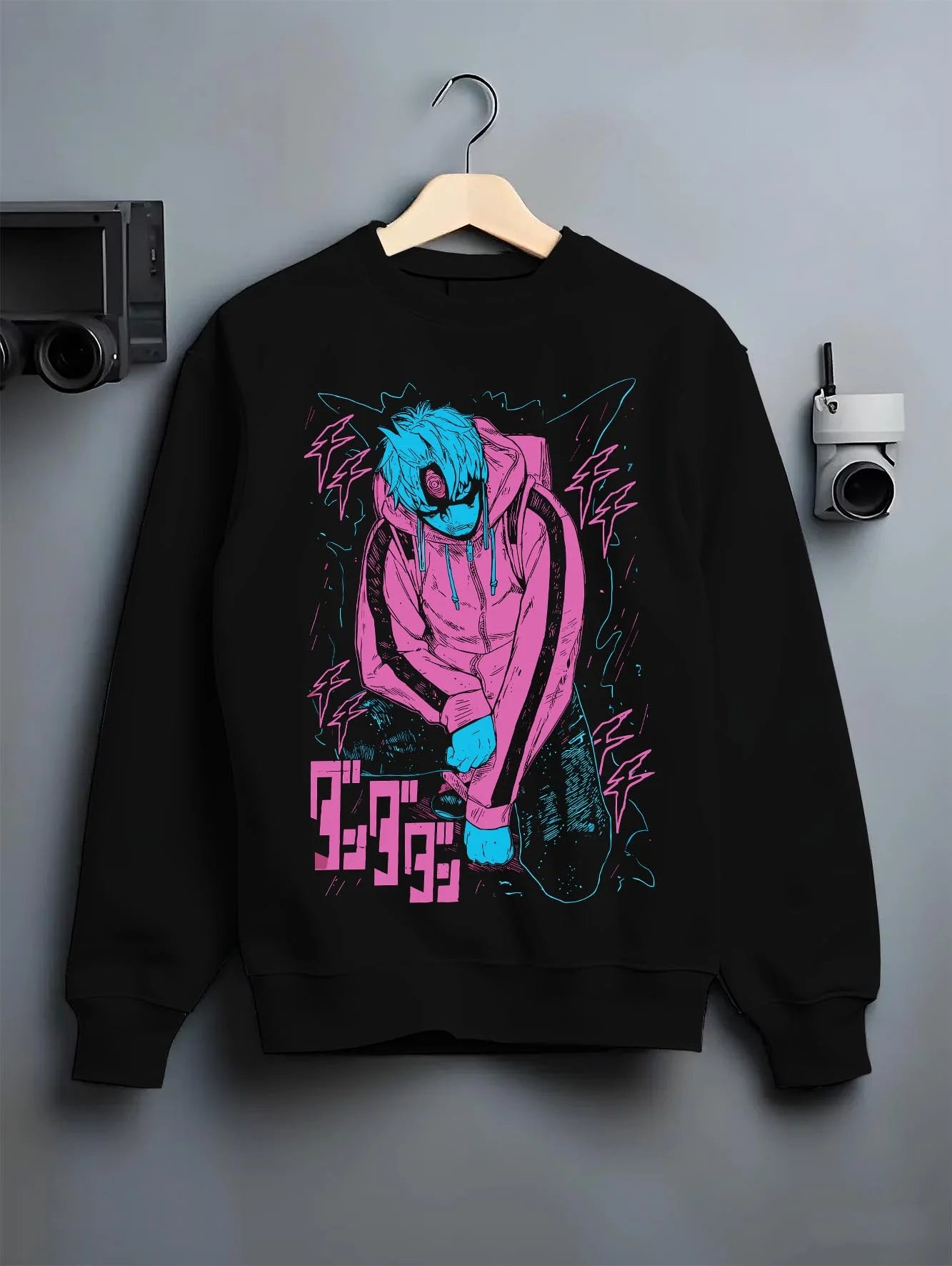 Black crewneck sweatshirt on hanger with JoJo Hoodie Yoshikage Kira Bizarre Adventure Killer graphic bold anime graphic.