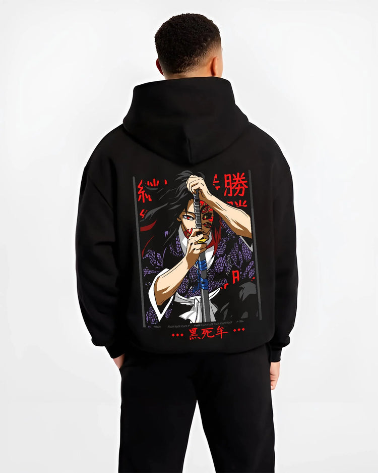 Black hoodie worn by male model, back view with Demon Slayer Hoodie Kokushibo Sword Form Jumper graphic bold anime graphic.