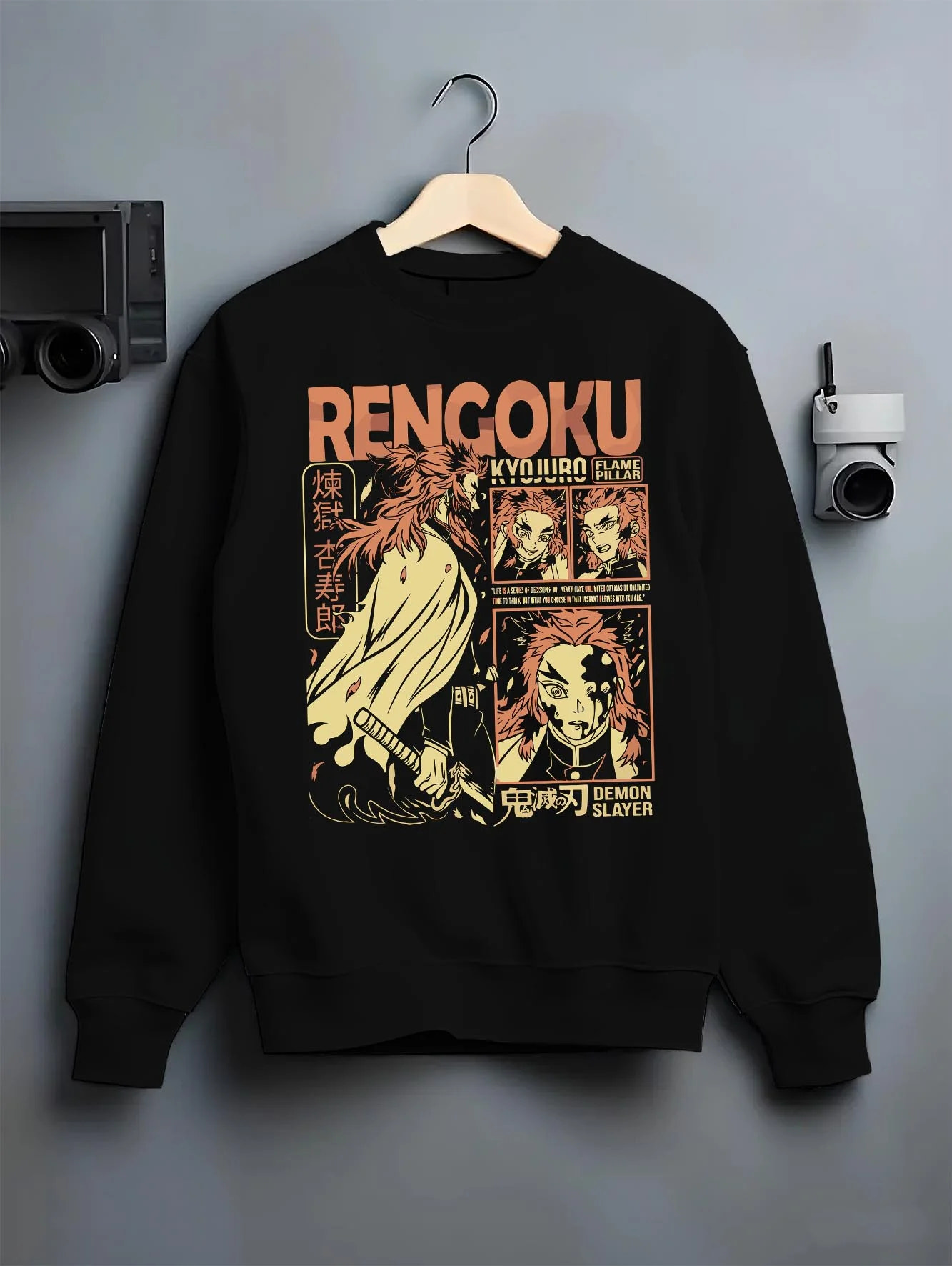 Black crewneck sweatshirt on hanger with Demon Slayer Rengoku Hoodie Flame Hashira Jumper graphic premium wear.