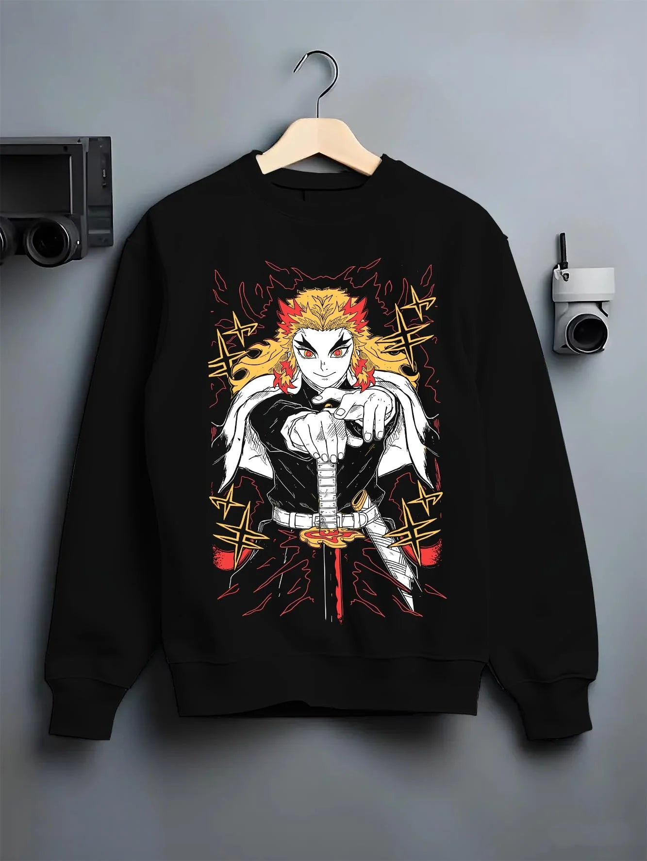 Black crewneck sweatshirt on hanger with Demon Slayer Rengoku Hoodie Flame Pillar Jumper graphic premium wear.