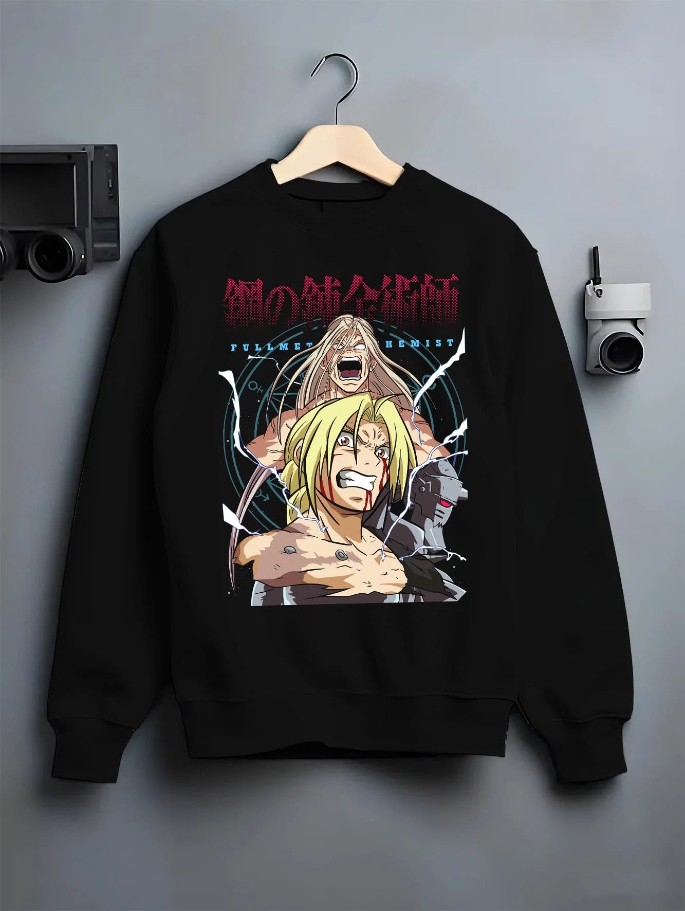 Black crewneck sweatshirt on hanger with Edward Elric Hoodie Fullmetal Alchemist Rage Battle graphic streetwear graphic.