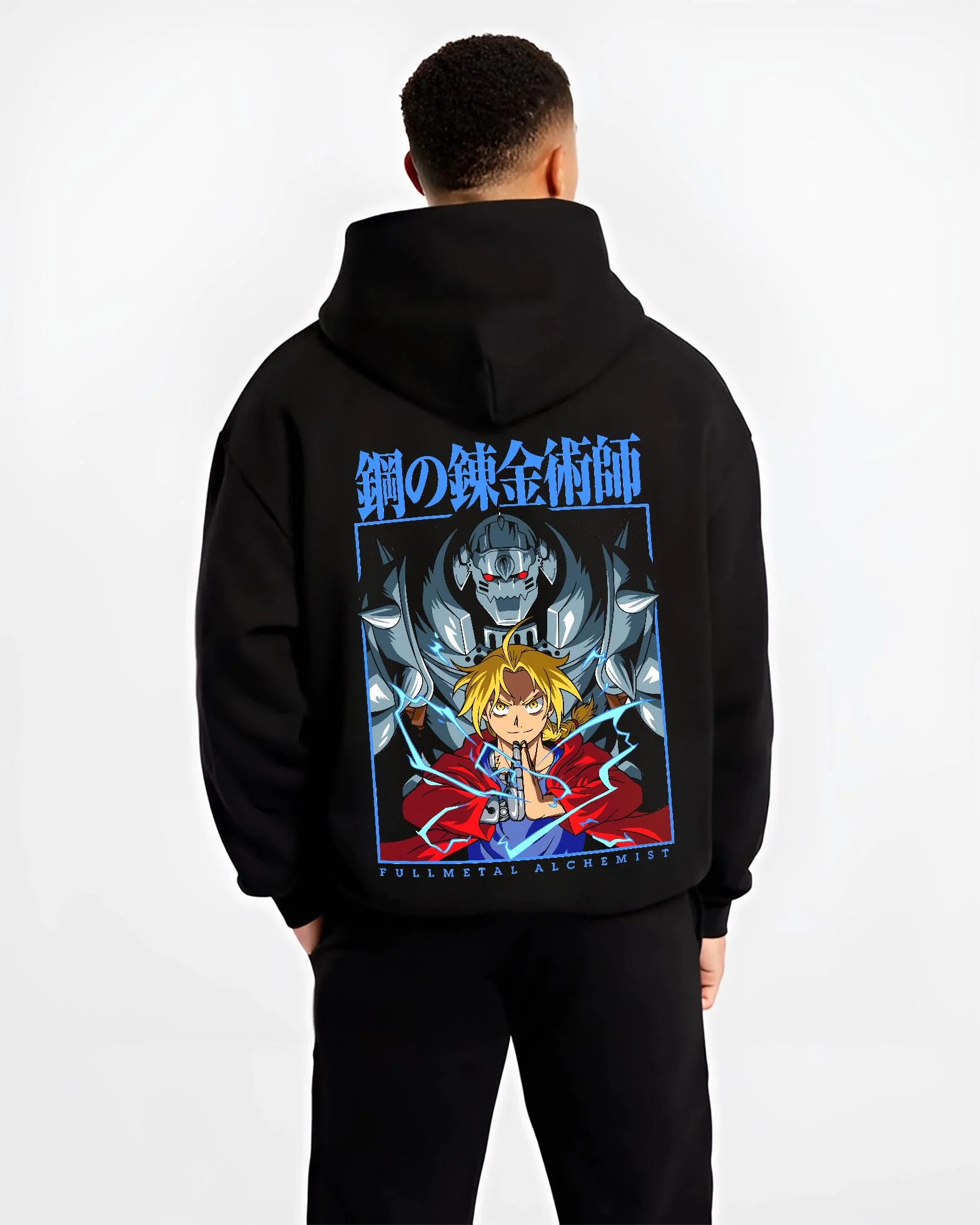 Black hoodie worn by male model, back view with Edward Elric Hoodie Fullmetal Alchemist Anime Panel graphic bold anime graphic.