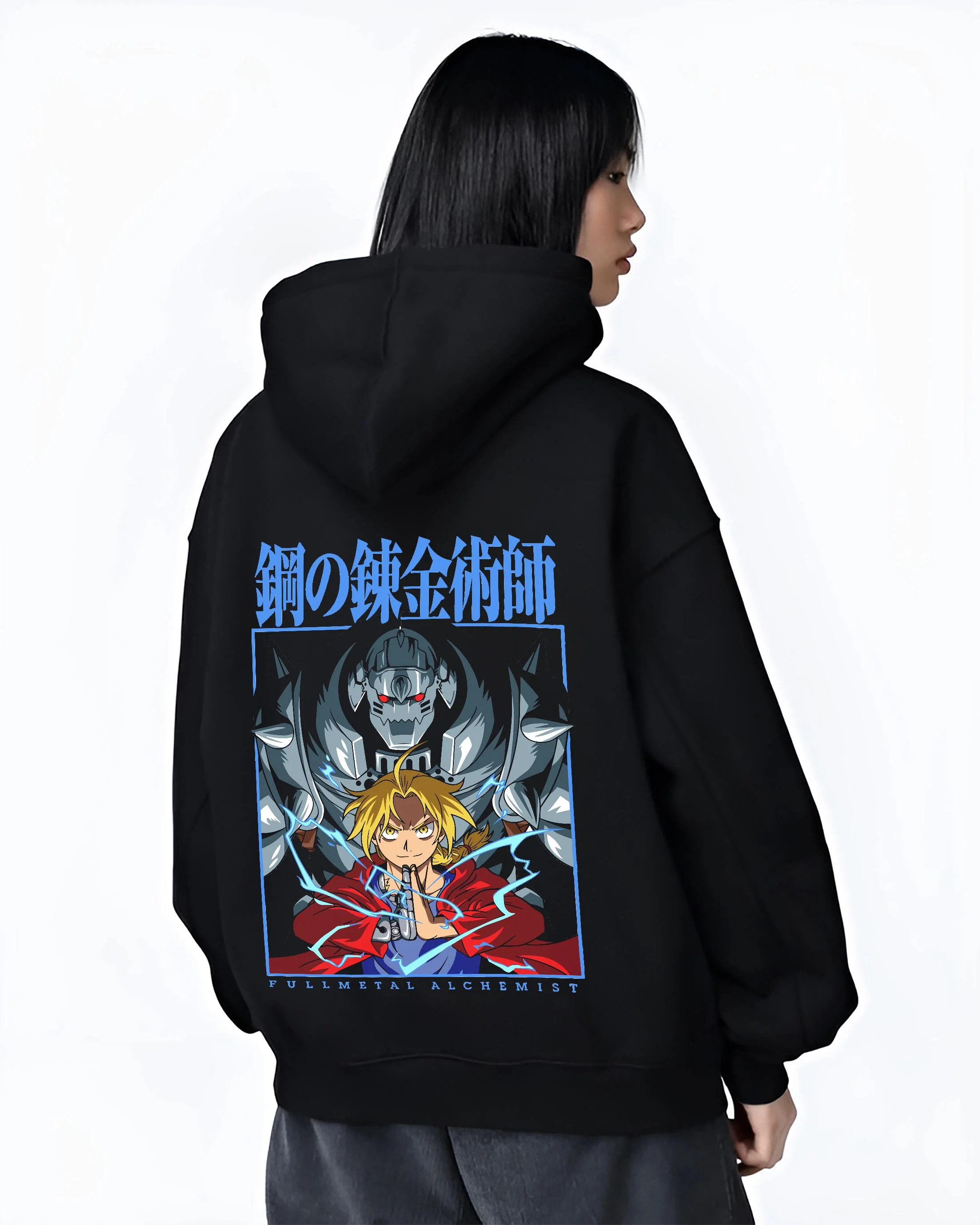 Black hoodie worn by female model, back view with Edward Elric Hoodie Fullmetal Alchemist Anime Panel graphic streetwear graphic.