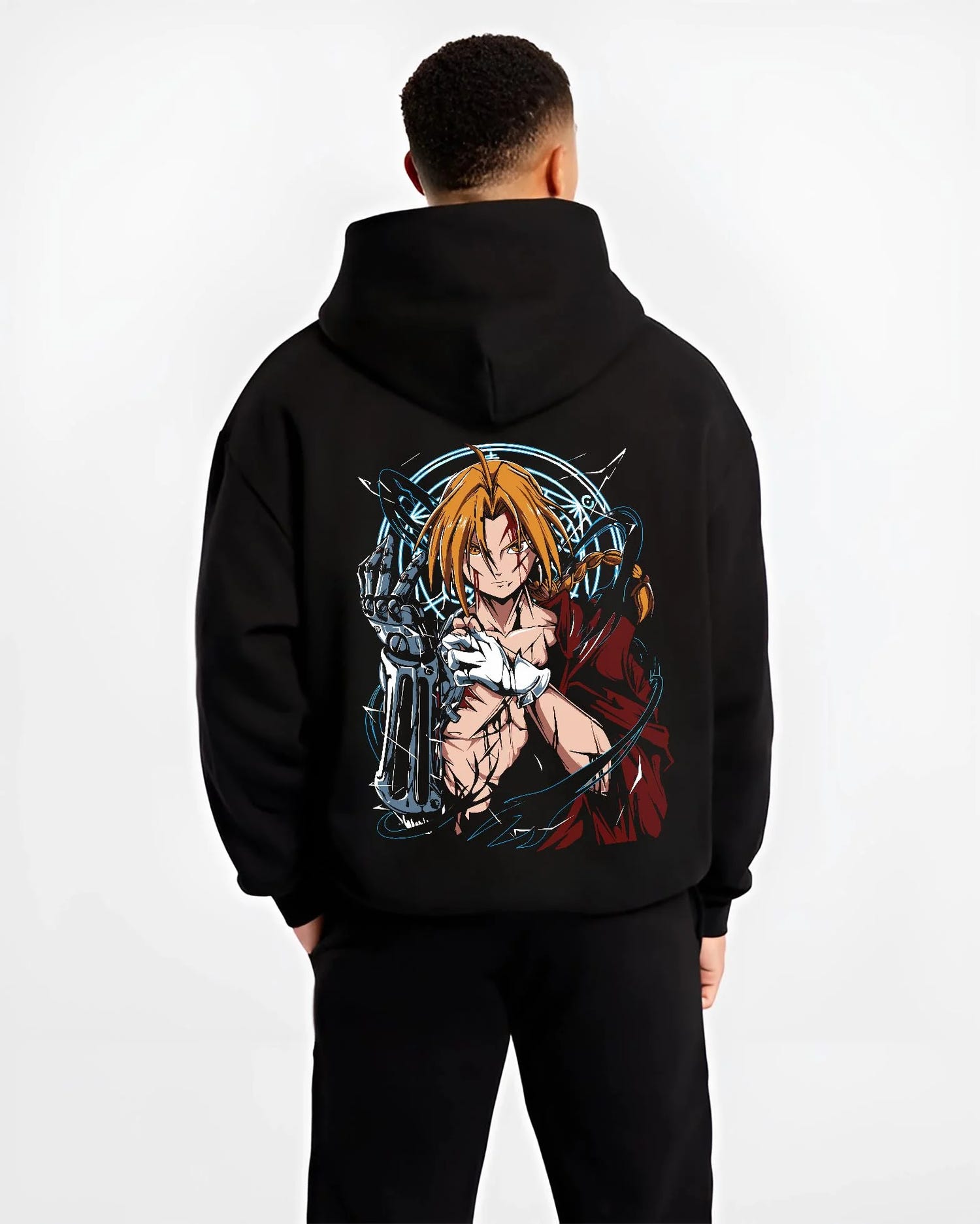 Black hoodie worn by male model, back view with Edward Elric Hoodie Fullmetal Alchemist Metal Arm graphic streetwear graphic.