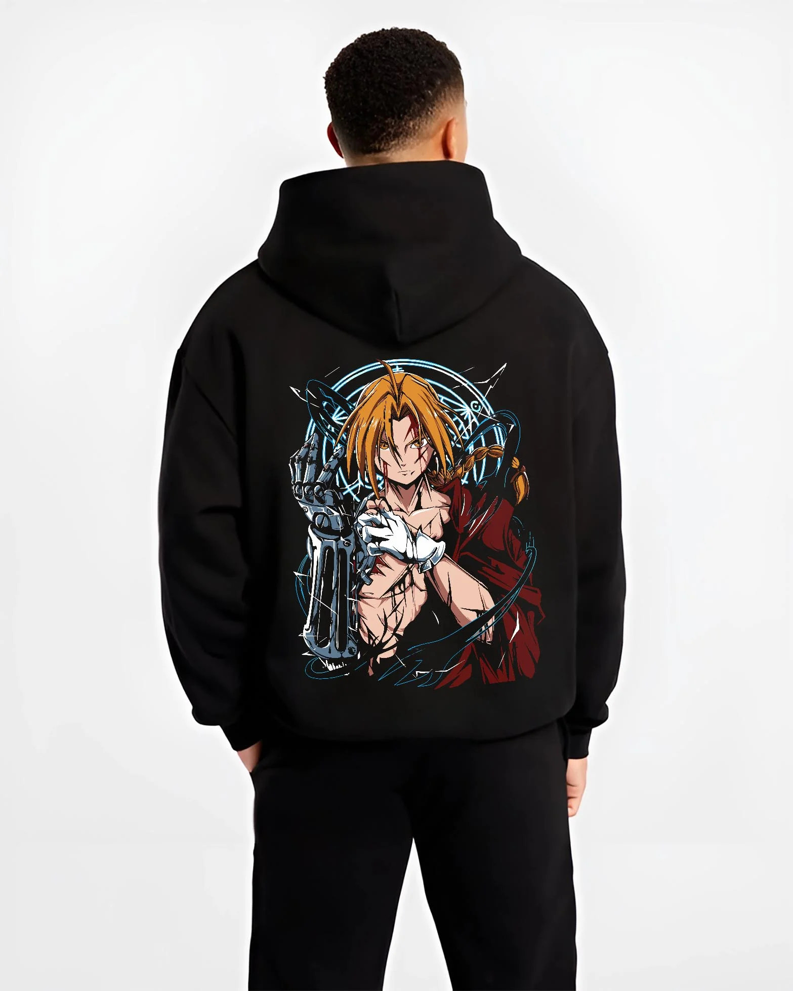 Black hoodie worn by male model, back view with Edward Elric Hoodie Fullmetal Alchemist Metal Arm graphic streetwear graphic.