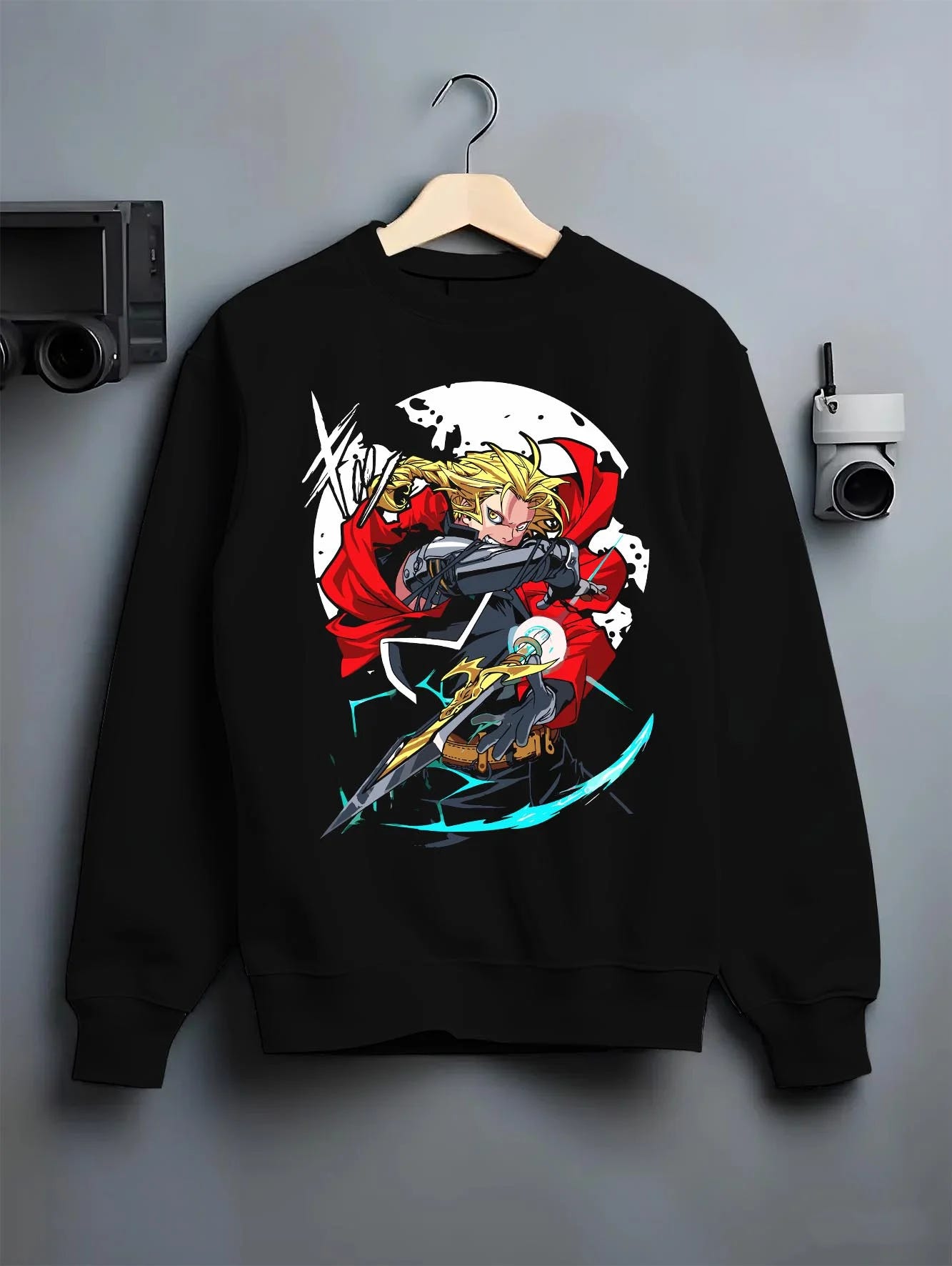 Black crewneck sweatshirt on hanger with Edward Elric Hoodie Fullmetal Alchemist Red Blade graphic bold anime graphic.