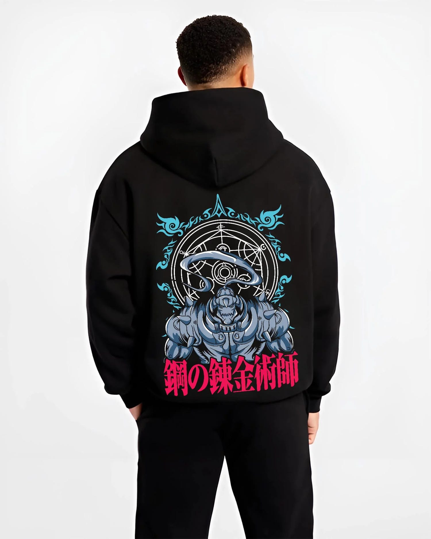 Black hoodie worn by male model, back view with Edward Elric Hoodie Fullmetal Alchemist Circle Glow graphic premium wear.