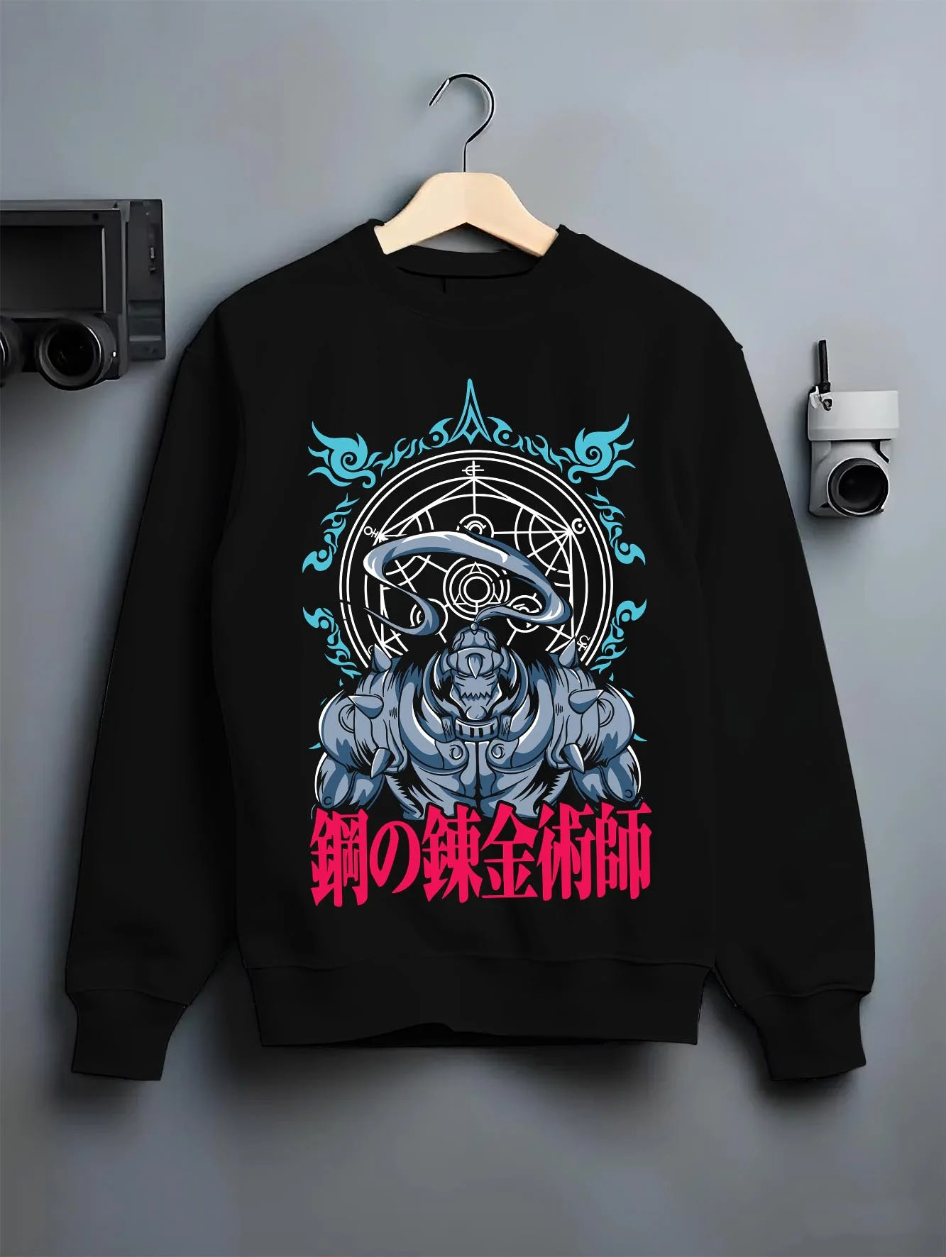 Black crewneck sweatshirt on hanger with Edward Elric Hoodie Fullmetal Alchemist Circle Glow graphic bold anime graphic.