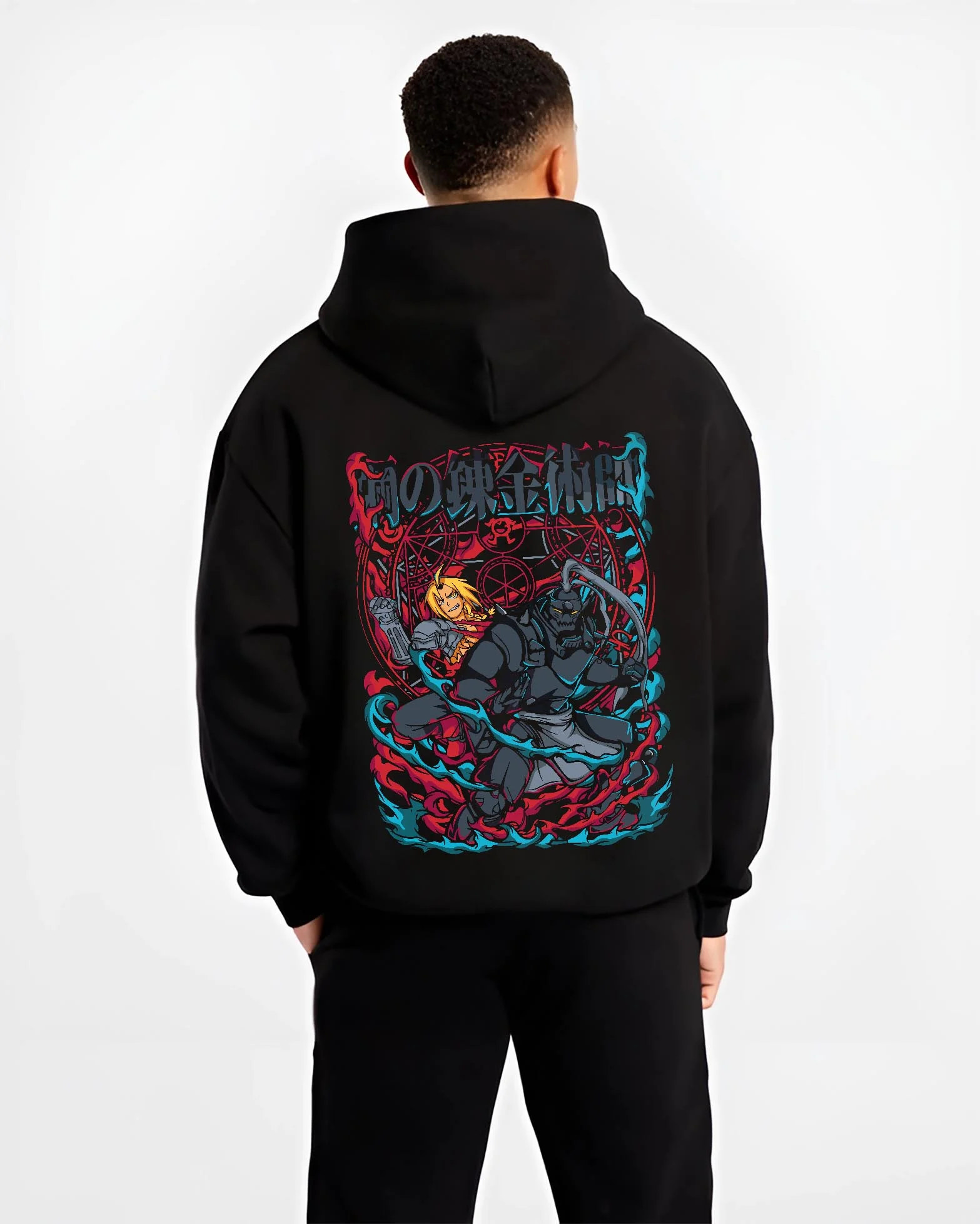 Black hoodie worn by male model, back view with Edward Elric Hoodie Fullmetal Alchemist Flame Scene graphic streetwear graphic.