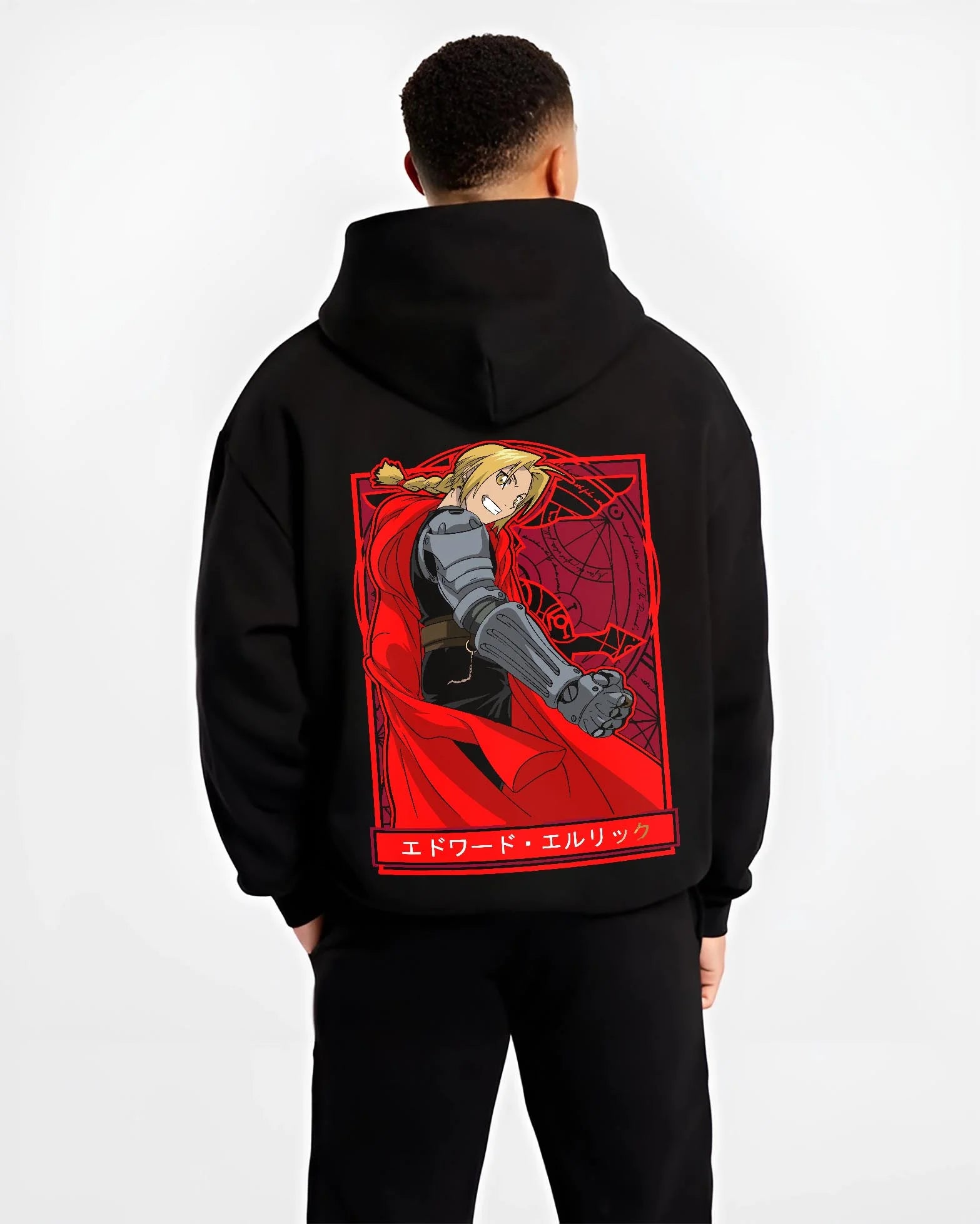 Black hoodie worn by male model, back view with Edward Elric Hoodie Fullmetal Alchemist Red Cape graphic streetwear graphic.