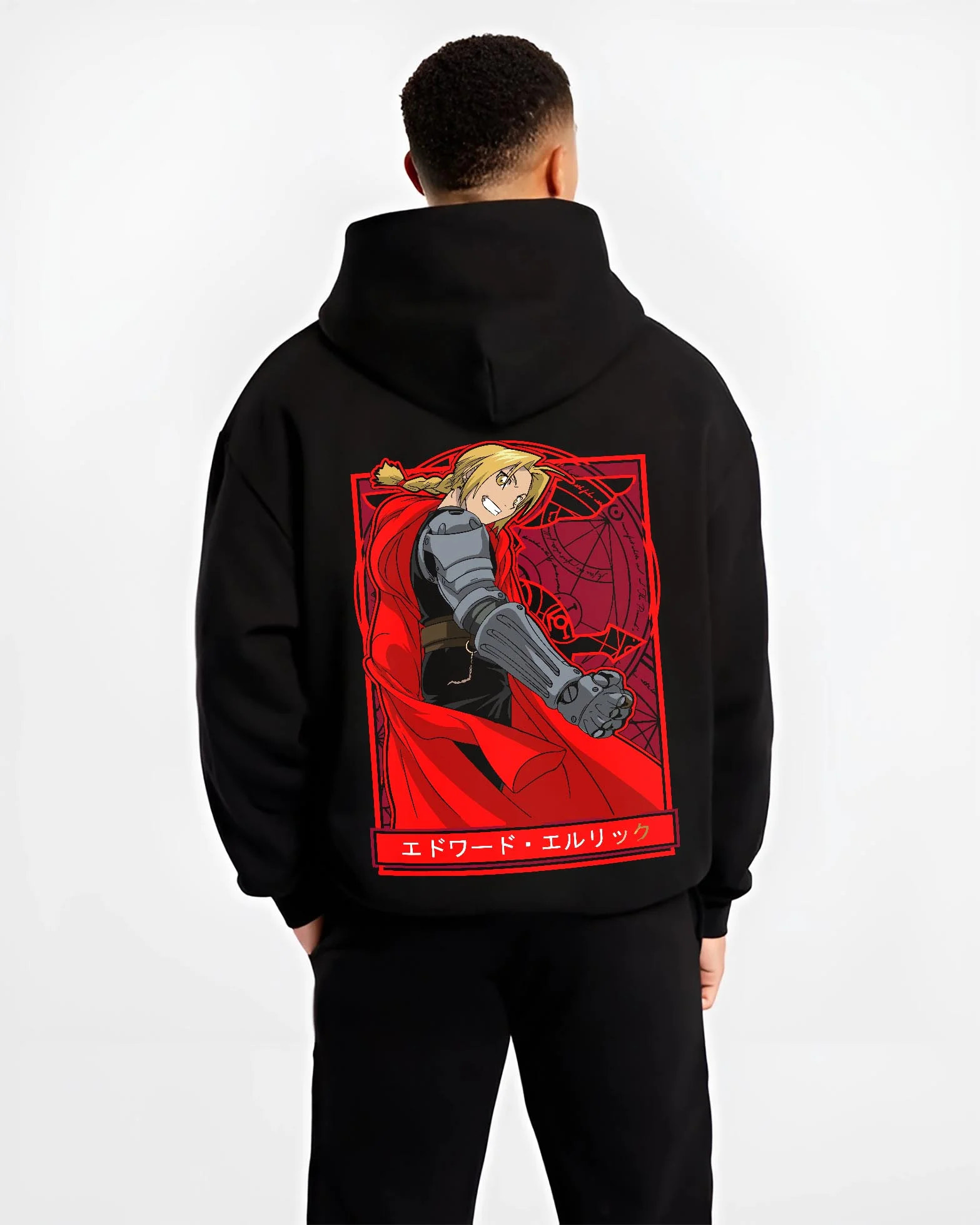 Black hoodie worn by male model, back view with Edward Elric Hoodie Fullmetal Alchemist Red Cape graphic streetwear graphic.