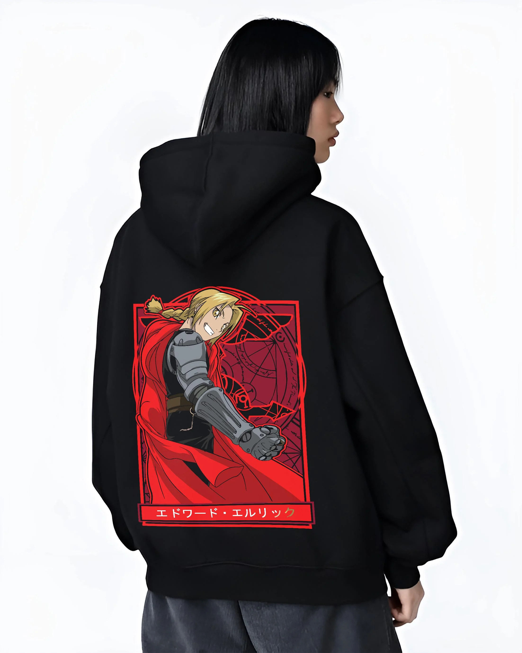 Black hoodie worn by female model, back view with Edward Elric Hoodie Fullmetal Alchemist Red Cape graphic bold anime graphic.
