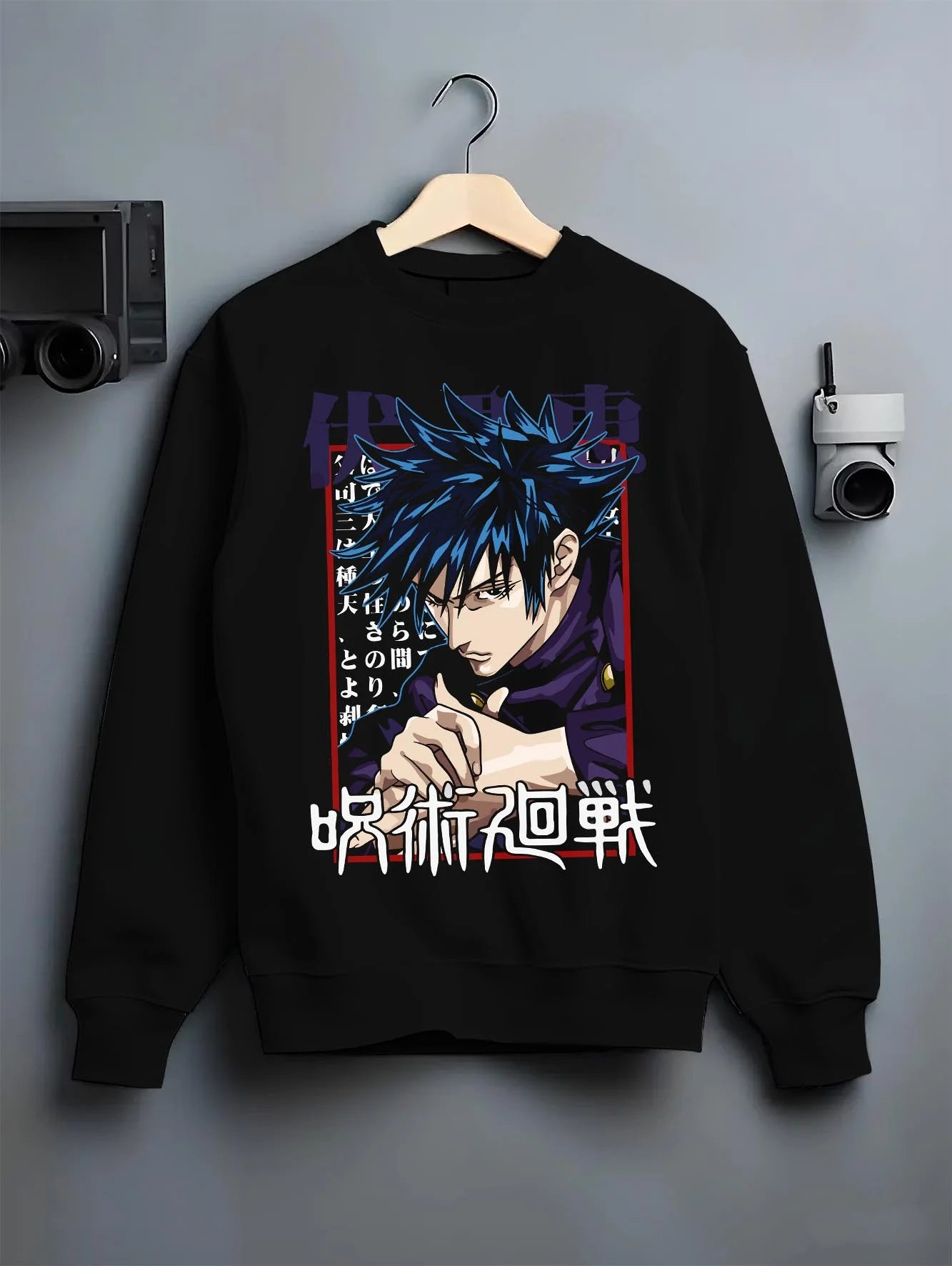Black crewneck sweatshirt on hanger with Megumi Fushiguro Hoodie Jujutsu Kaisen Cursed Energy graphic streetwear graphic.