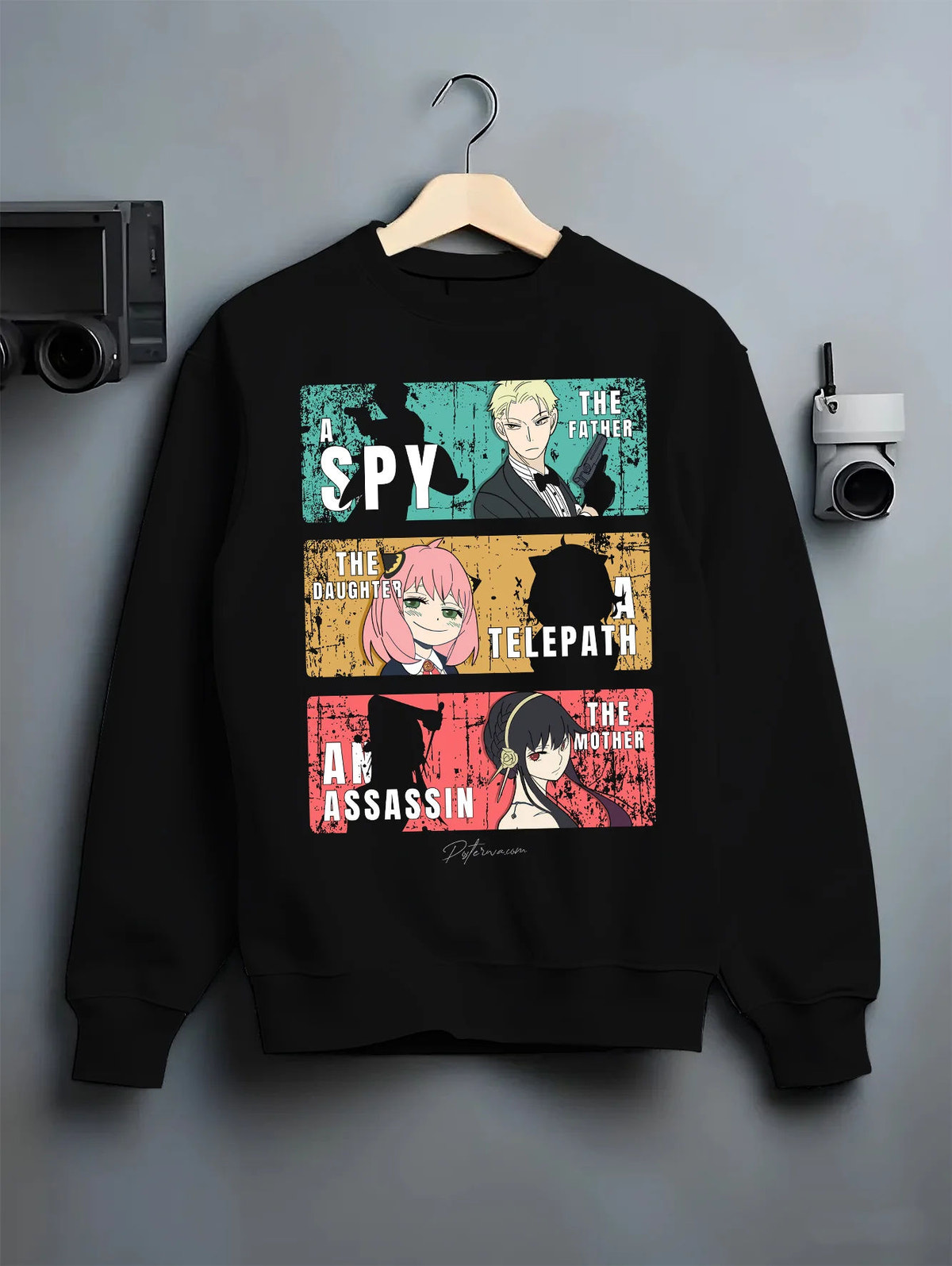 Black crewneck sweatshirt on hanger with Loid, Anya and Yor Forger collage from Spy x Family illustrated back graphic
