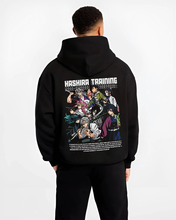 Black hoodie worn by male model, back view with Demon Slayer Hoodie Hashira Training Group Roster graphic premium wear.