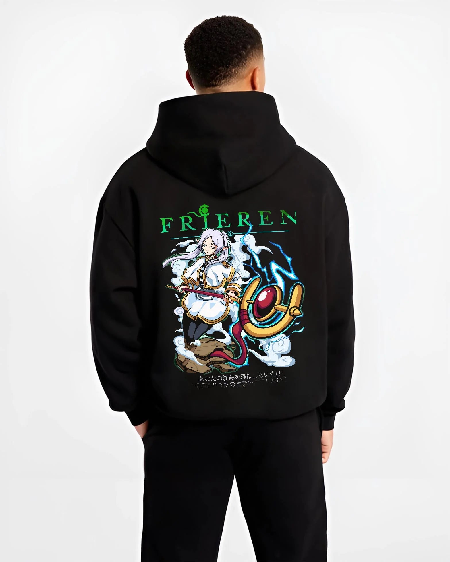 Black hoodie worn by male model, back view with Frieren Hoodie Beyond Journey’s End Magic Pose graphic streetwear graphic.