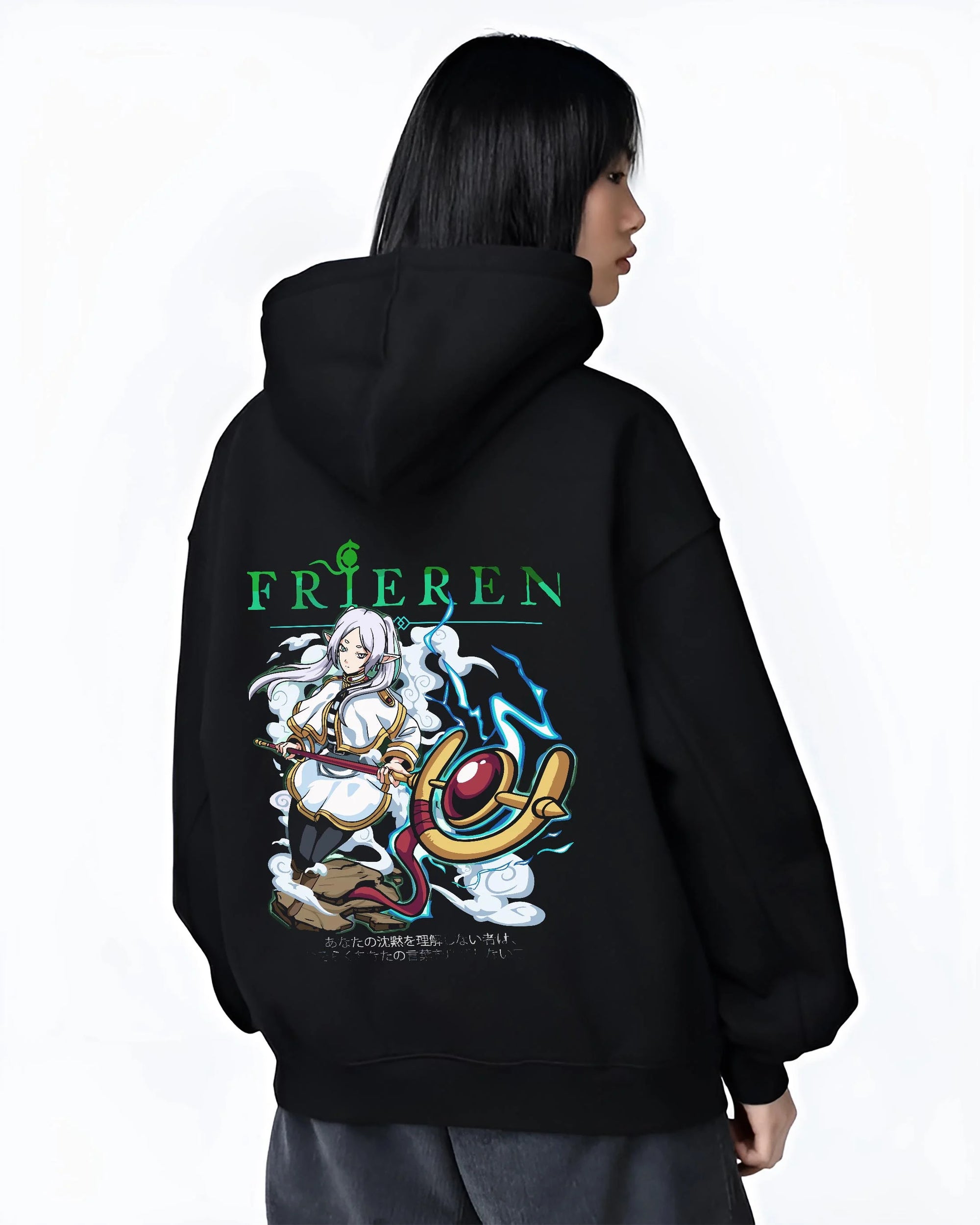 Black hoodie worn by female model, back view with Frieren Hoodie Beyond Journey’s End Magic Pose graphic streetwear graphic.