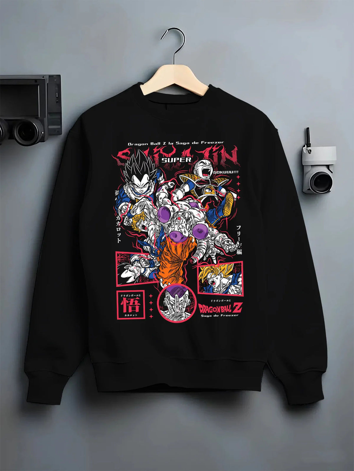 Black crewneck sweatshirt on hanger with Frieza and Dragon Ball Z fighters collage illustrated back graphic