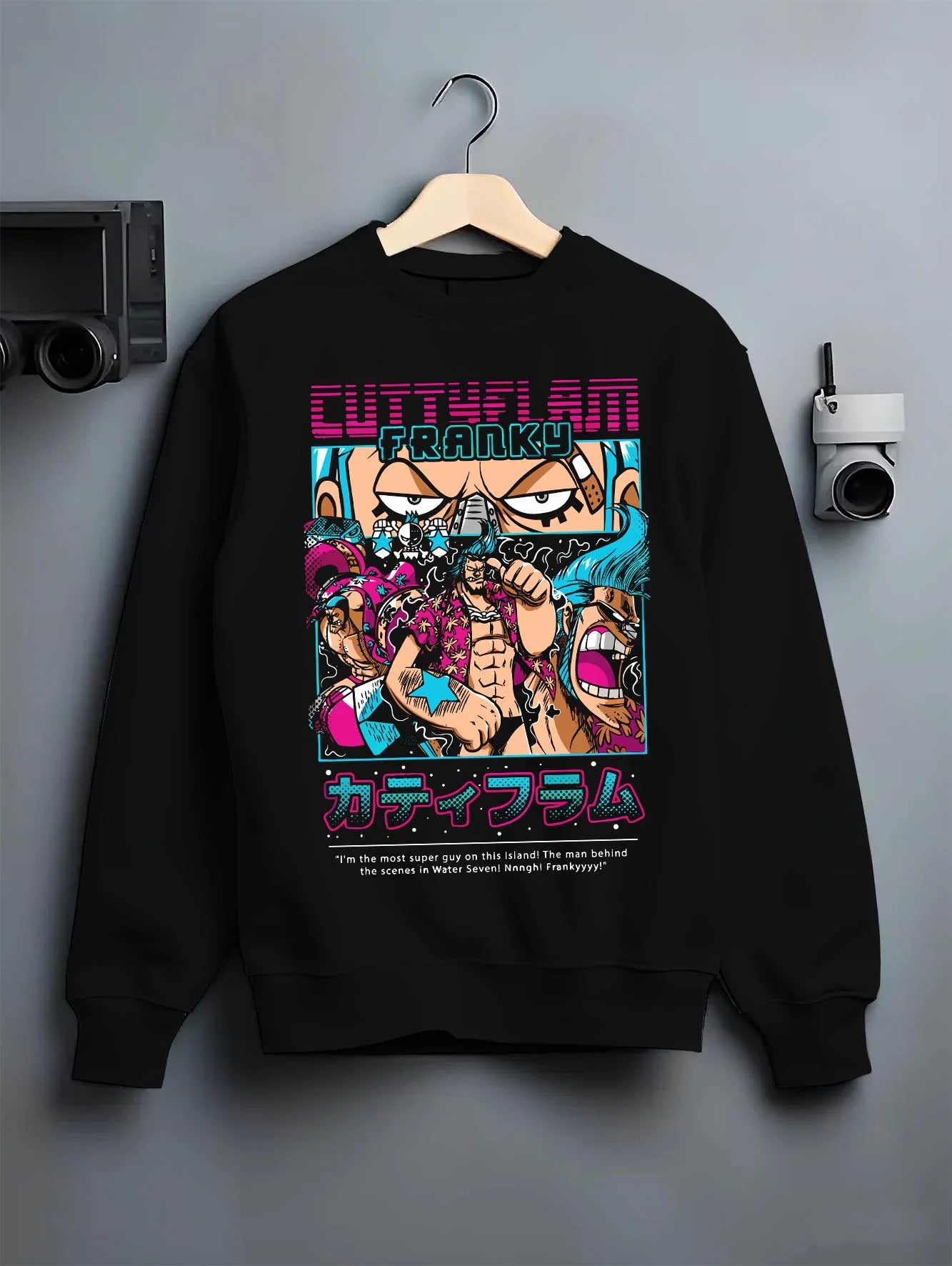 Black crewneck sweatshirt on hanger with Franky Hoodie One Piece Cyborg Cola Power Burst graphic premium wear.